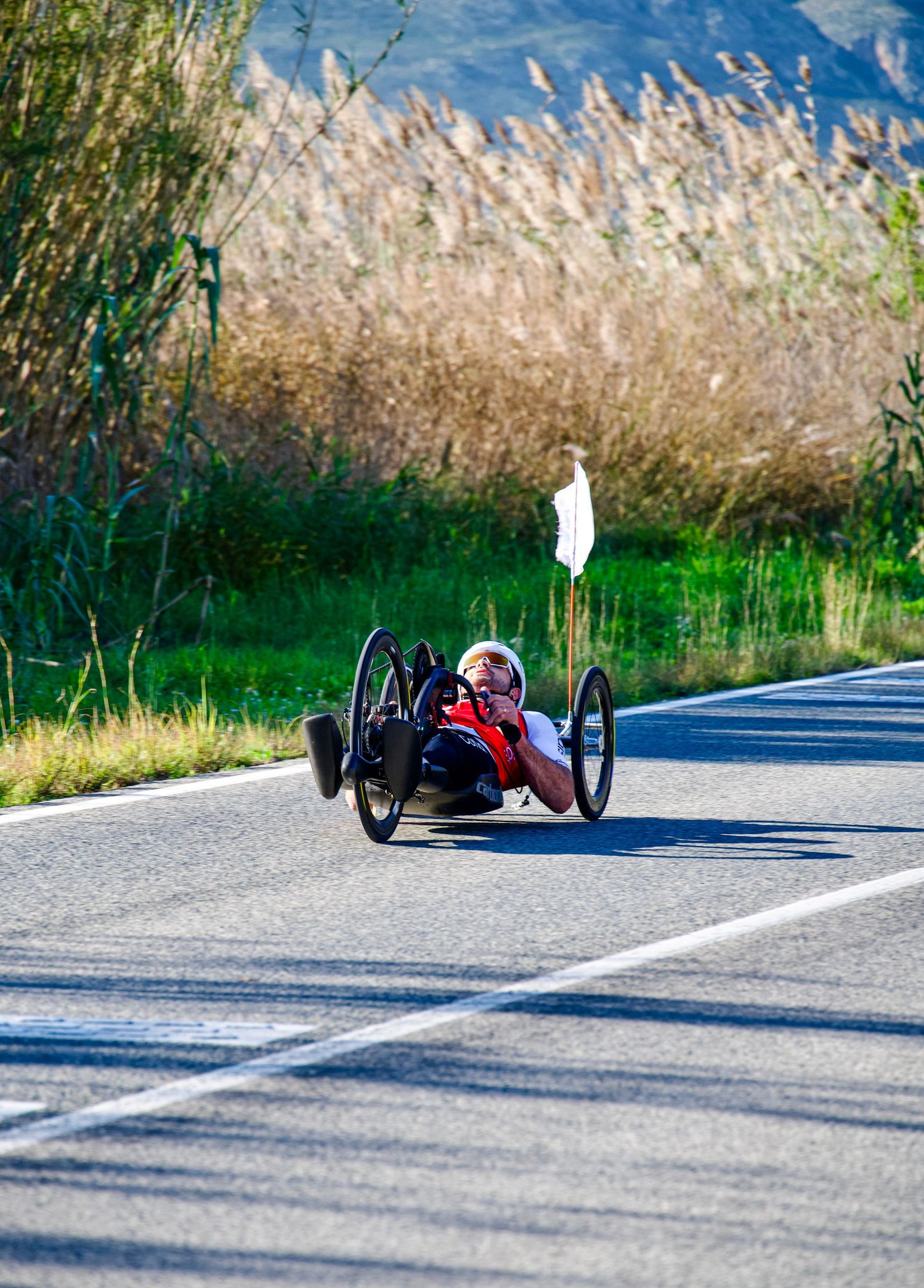 Mathieu Bosredon of Team Cofidis in his handbike in the marshland near Pego, Spain.