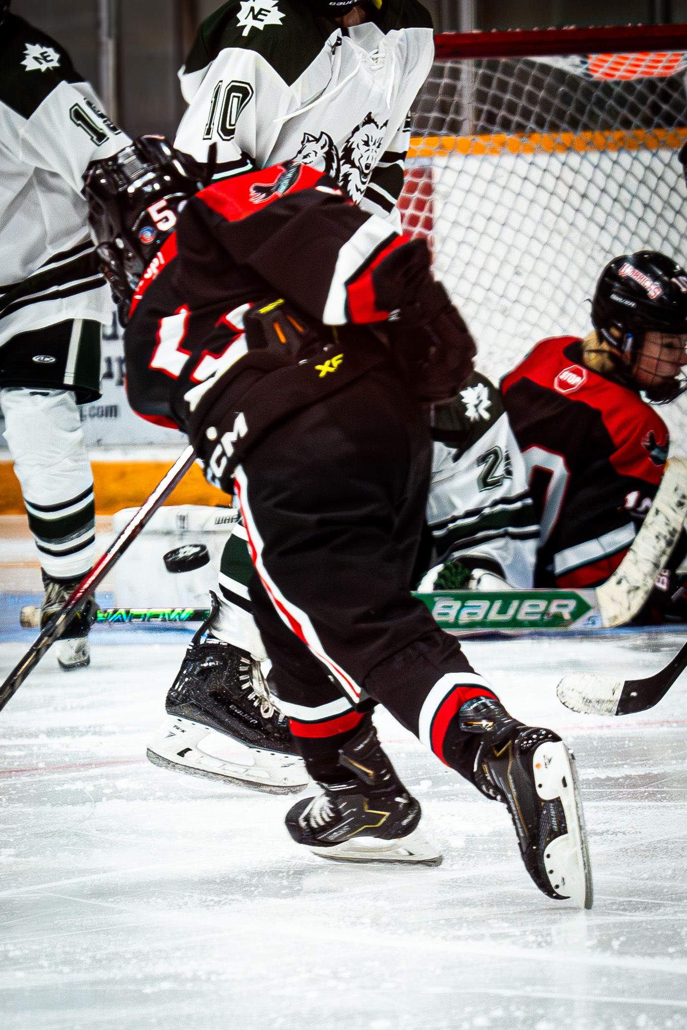 Bentley Dombowsky (#5) fires a shot on net during U13 AA action.