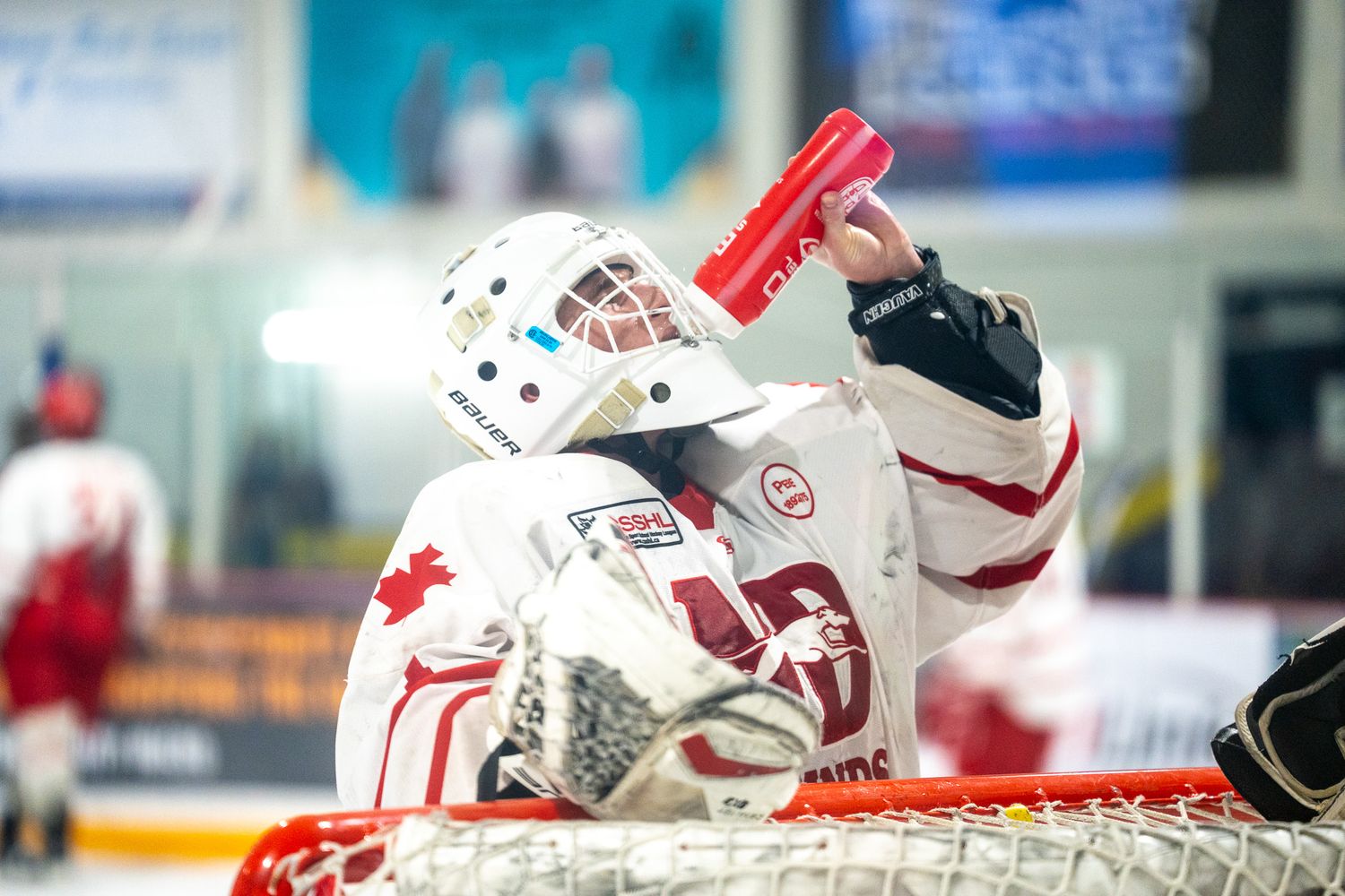 ND Hounds goalie pauses for a drink during a break in U18 Prep action.