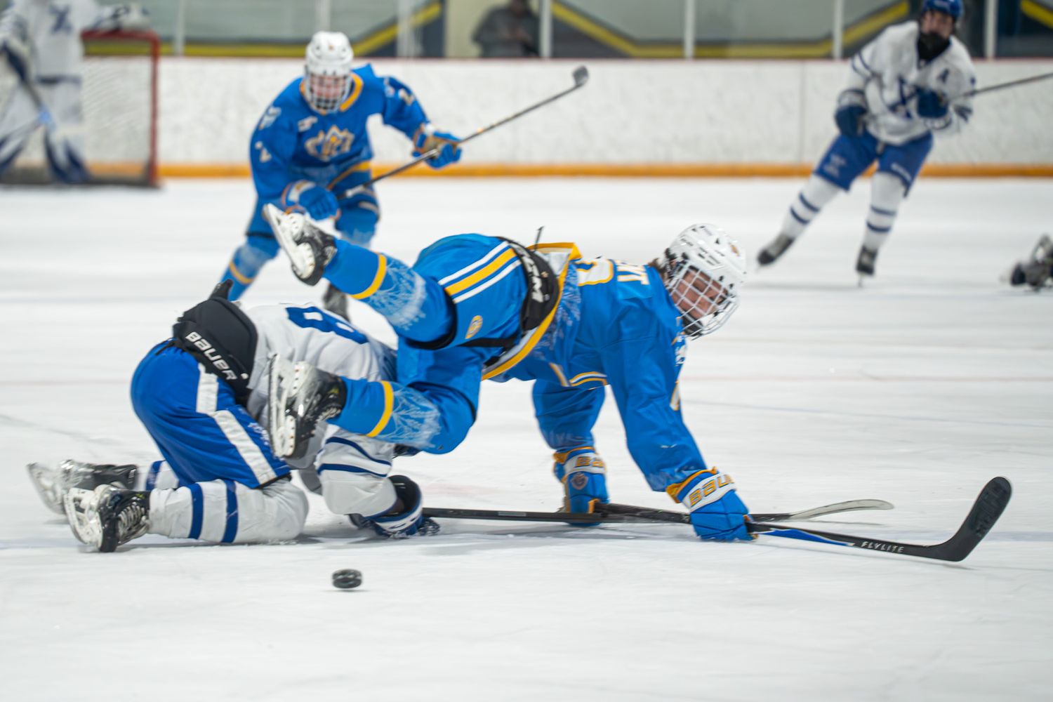 Player battle to the ice in this high flying affair.