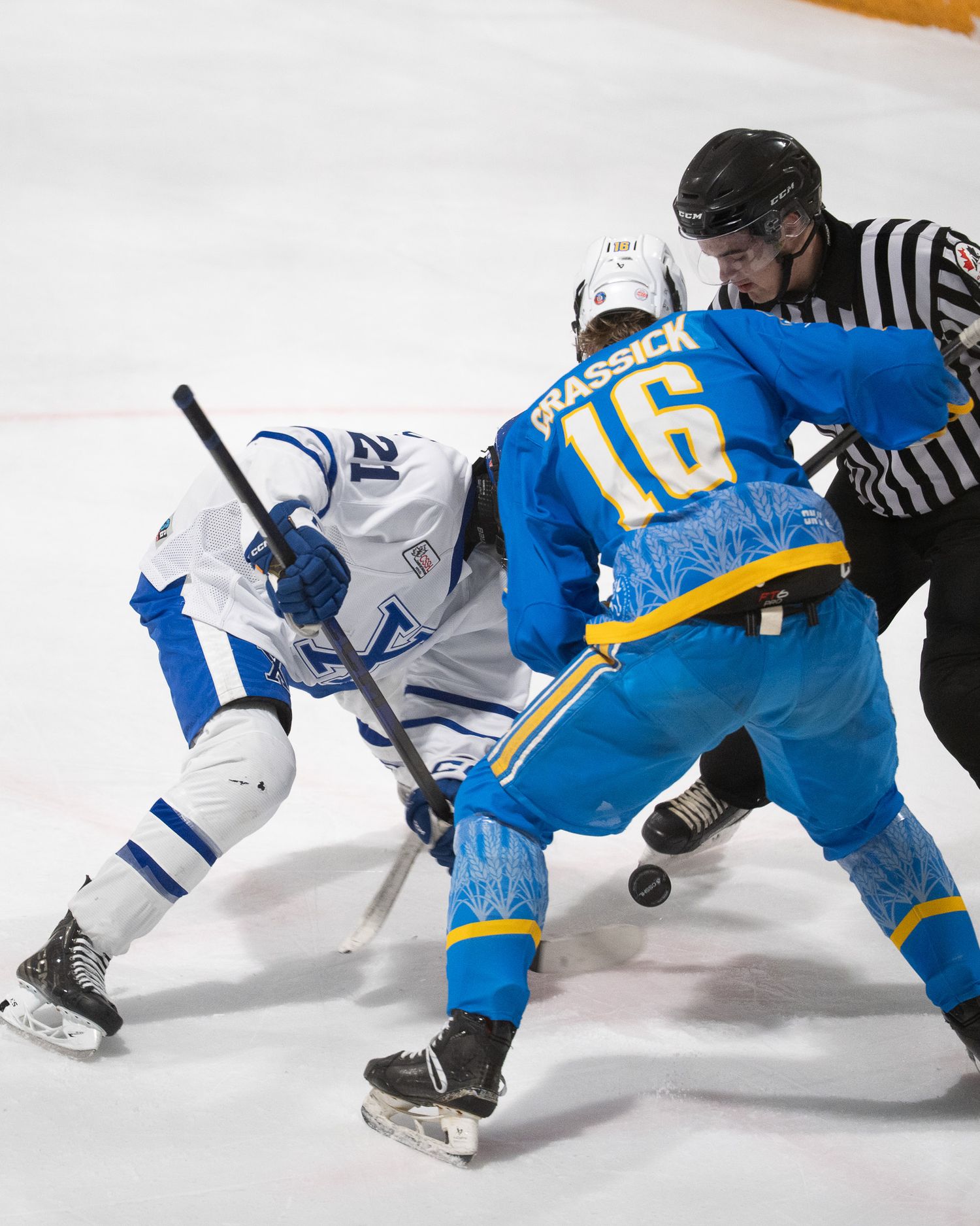 Grassick taking the face off for Prairie Hockey Academy.