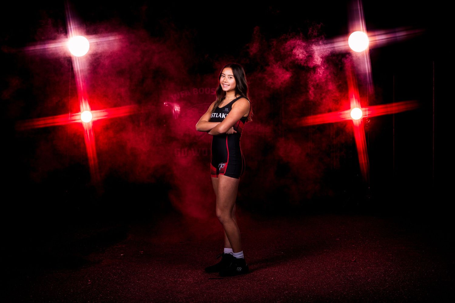 Dance poses captured with red star lighting effects against black background.