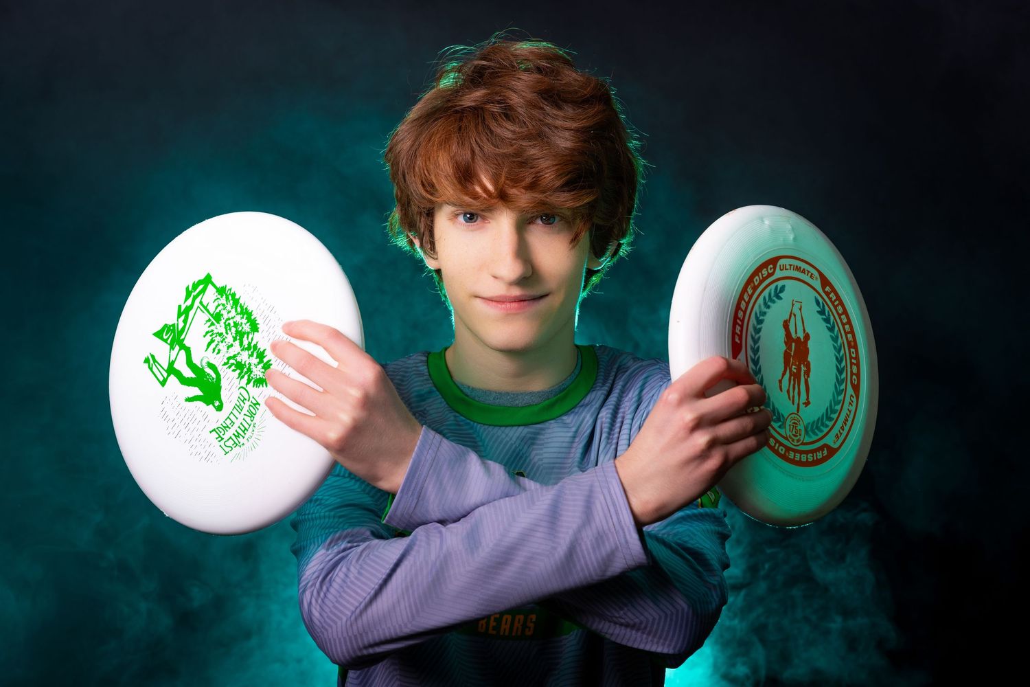 A sequence of images showing someone juggling green and white balloons against a dark background.