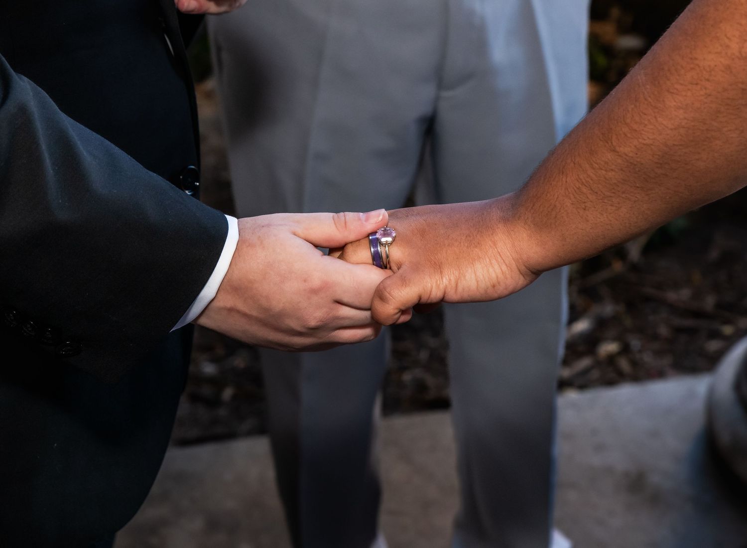 A close up of two hands showing the wedding ring of one of bride in Brooklyn, NY
