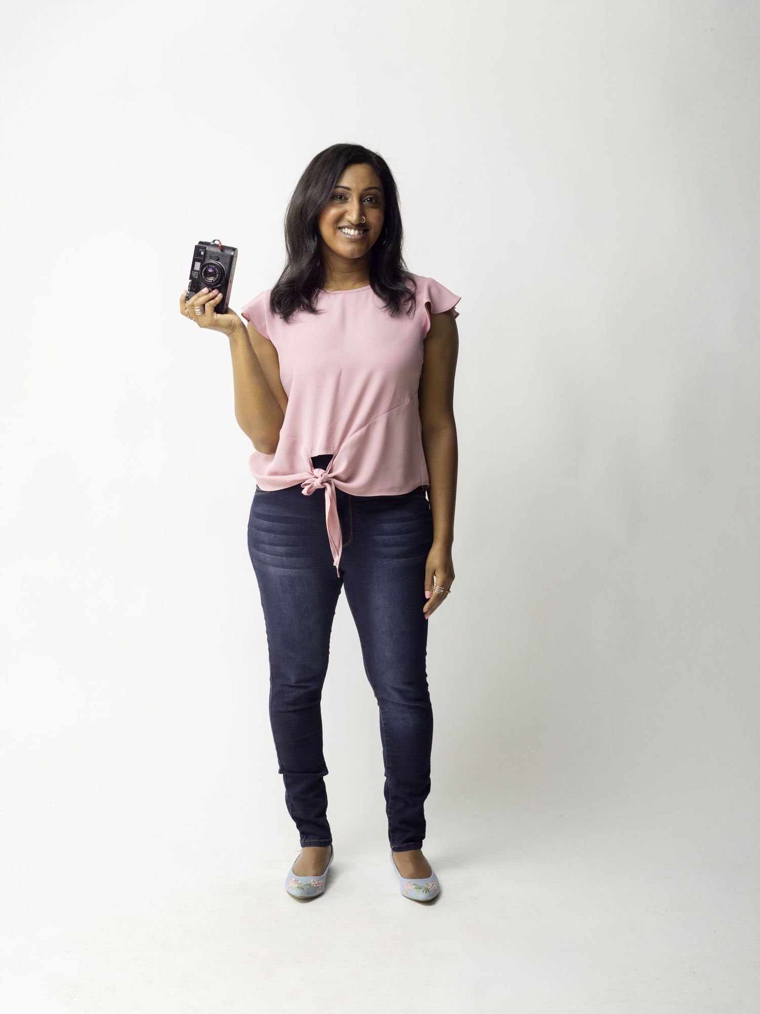 Portrait of Santa Cruz photographer Kavya Iyer in a studio