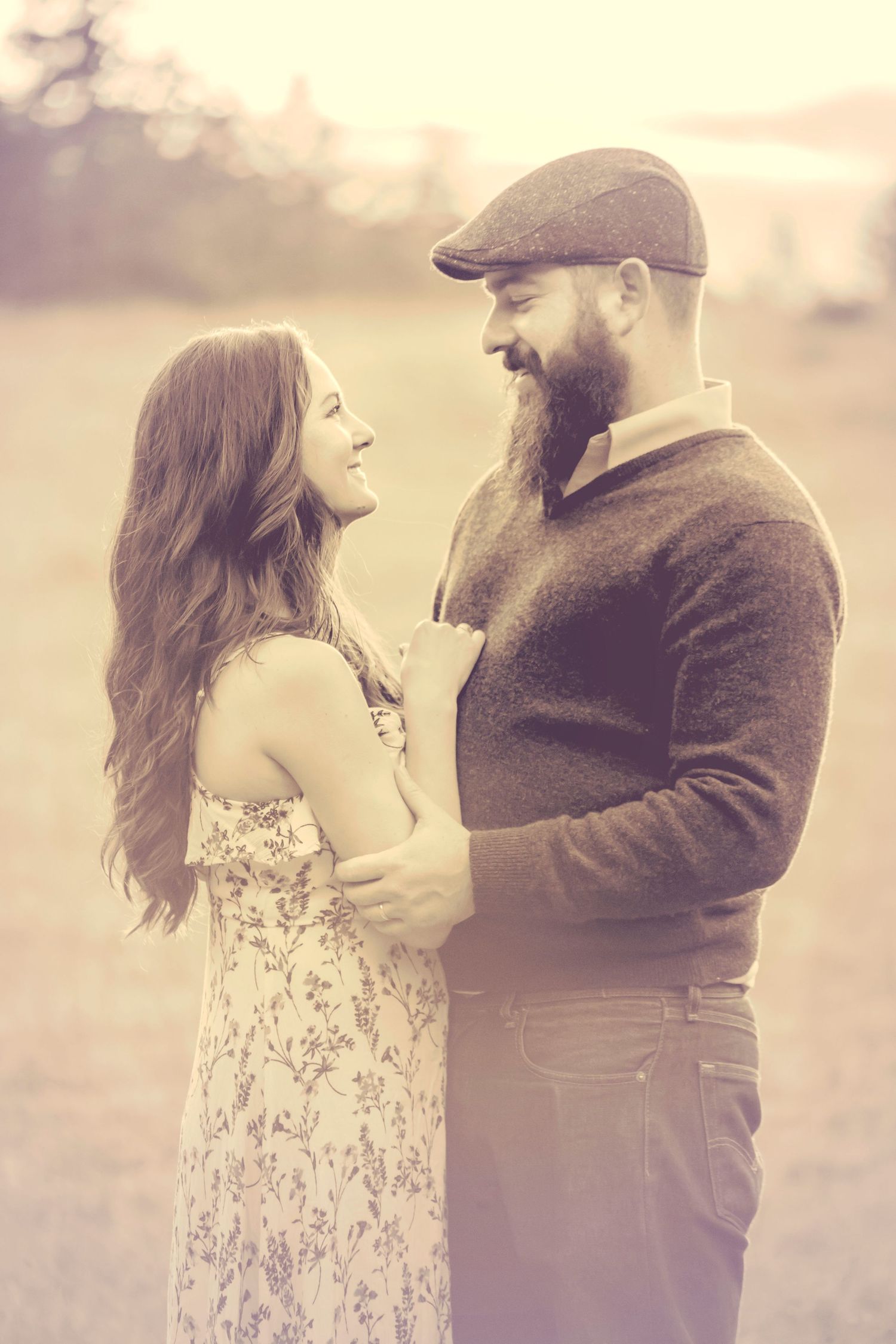 Engagement photo session in the Santa Cruz redwoods, capturing a couple in natural light with intimate, candid moments among towering trees
