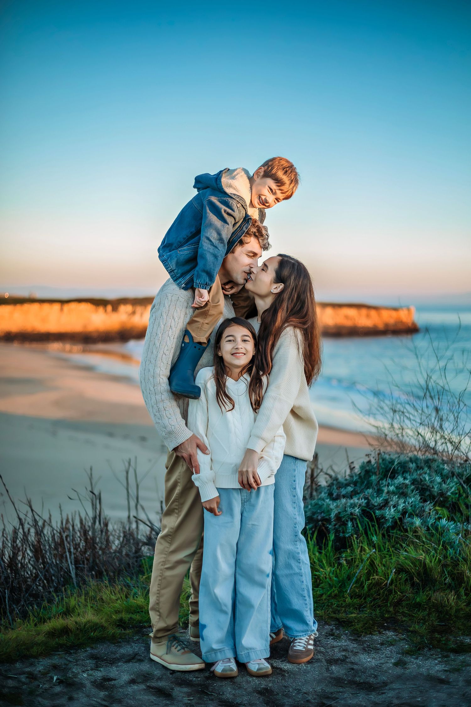 Family photo session at Wilder Ranch in Santa Cruz, candid moments, coastal scenery, and a warm, relaxed outdoor setting.