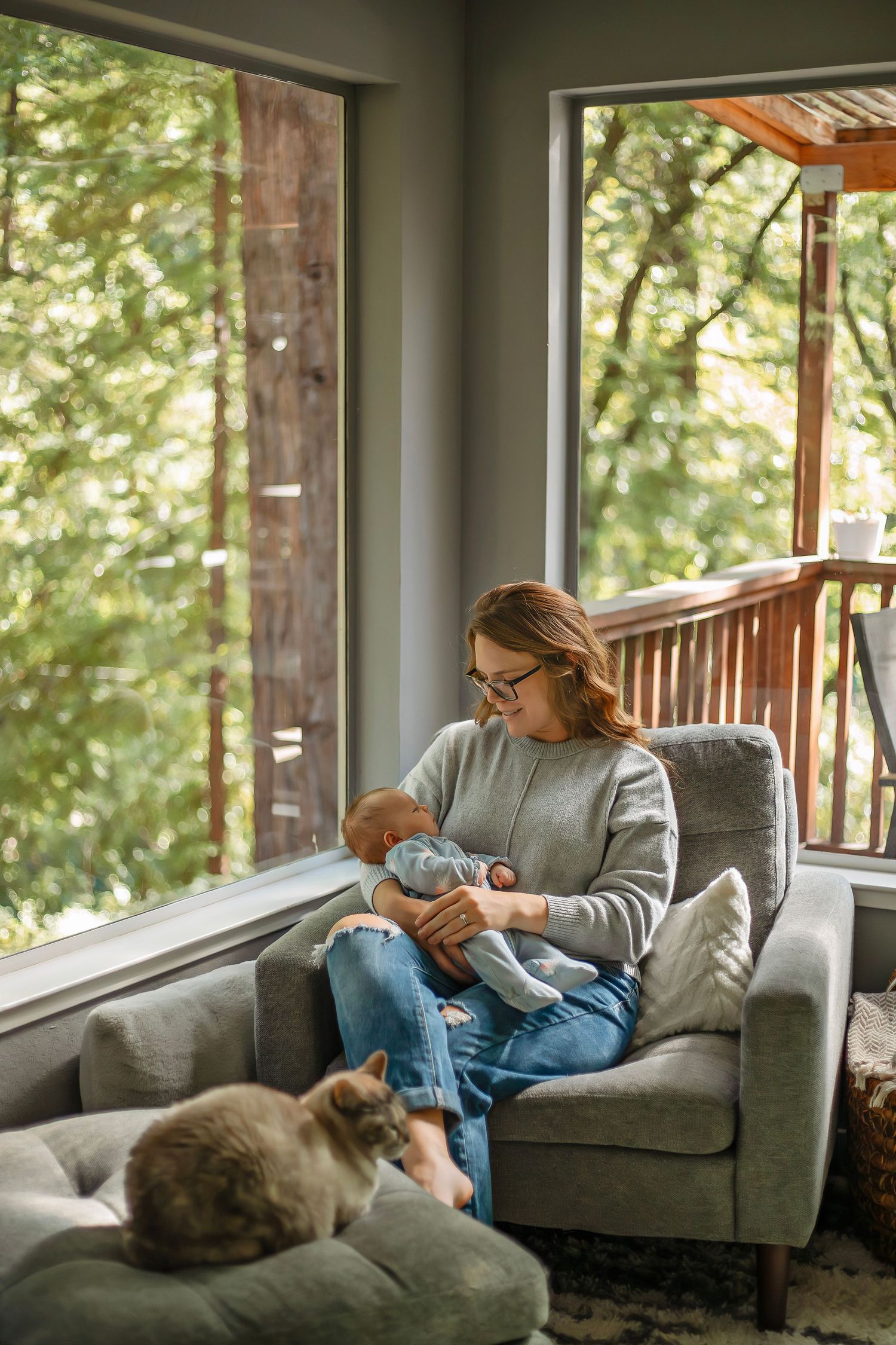 At-home newborn photo session in Santa Cruz, capturing a family’s intimate, candid moments with warmth and heartfelt connection