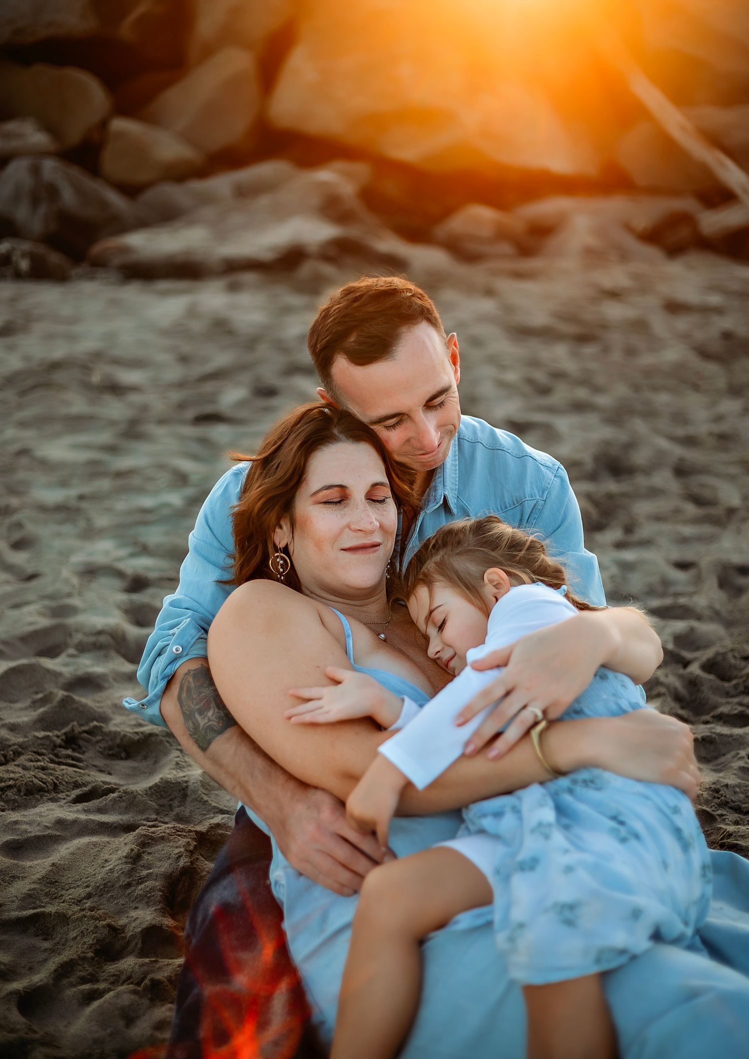 Family enjoying at the beach in Santa Cruz, captured in natural light with candid moments, ocean views, and a relaxed coastal setting