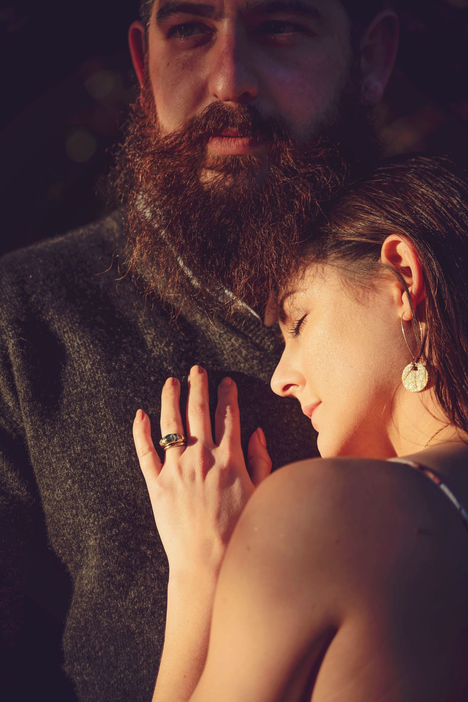 Engagement photo session in the Santa Cruz redwoods, capturing a couple in natural light with intimate, candid moments among towering trees