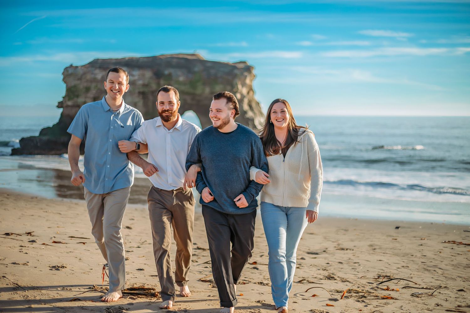 Cousins enjoying a beach in Santa Cruz, captured in natural light with candid, joyful moments and scenic coastal views.