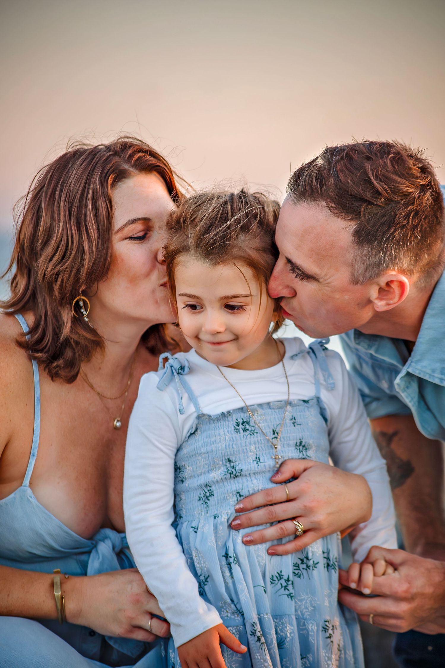 Family enjoying at the beach in Santa Cruz, captured in natural light with candid moments, ocean views, and a relaxed coastal setting