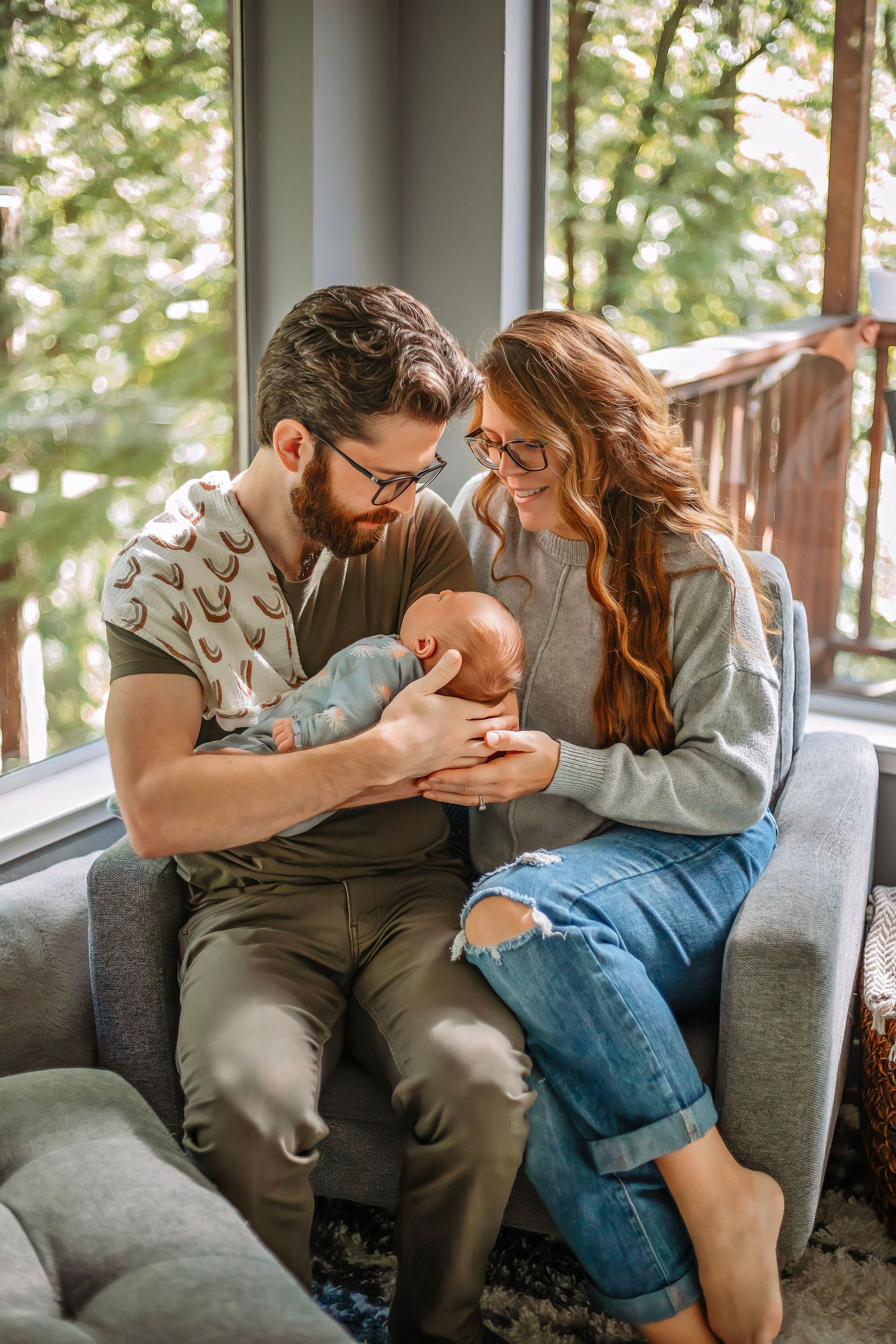 At-home newborn photo session in Santa Cruz, capturing a family’s intimate, candid moments with warmth and heartfelt connection