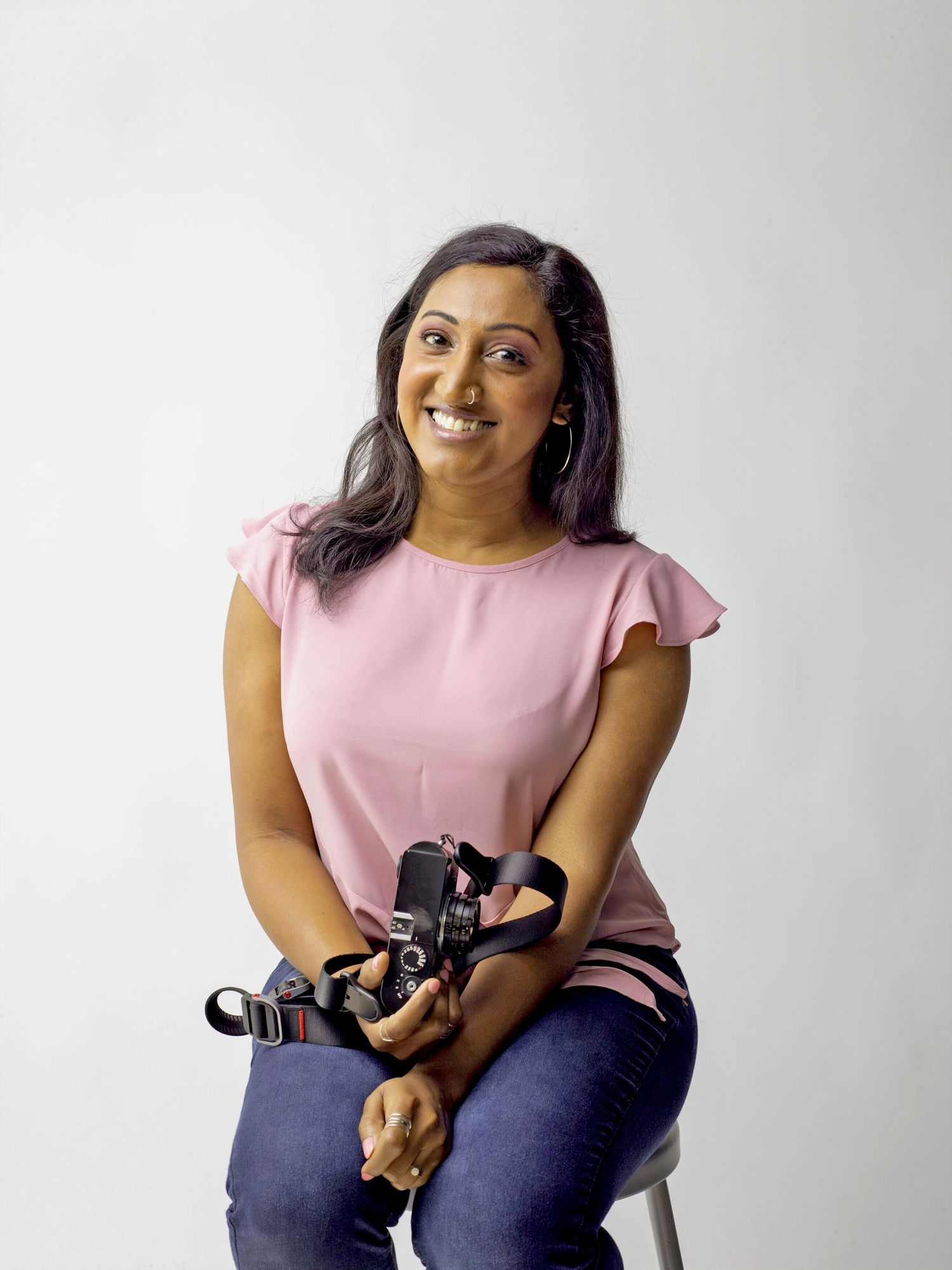 Portrait of Santa Cruz photographer Kavya Iyer in a studio