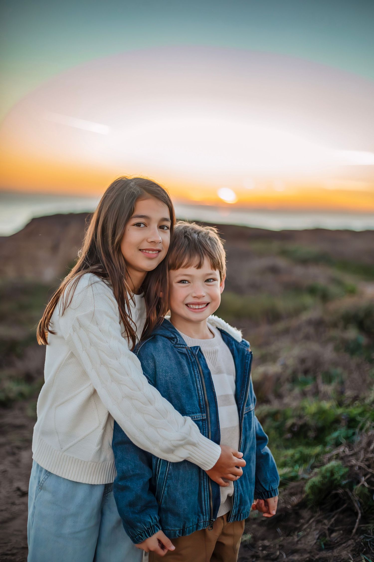 Family photo session at Wilder Ranch in Santa Cruz, candid moments, coastal scenery, and a warm, relaxed outdoor setting.