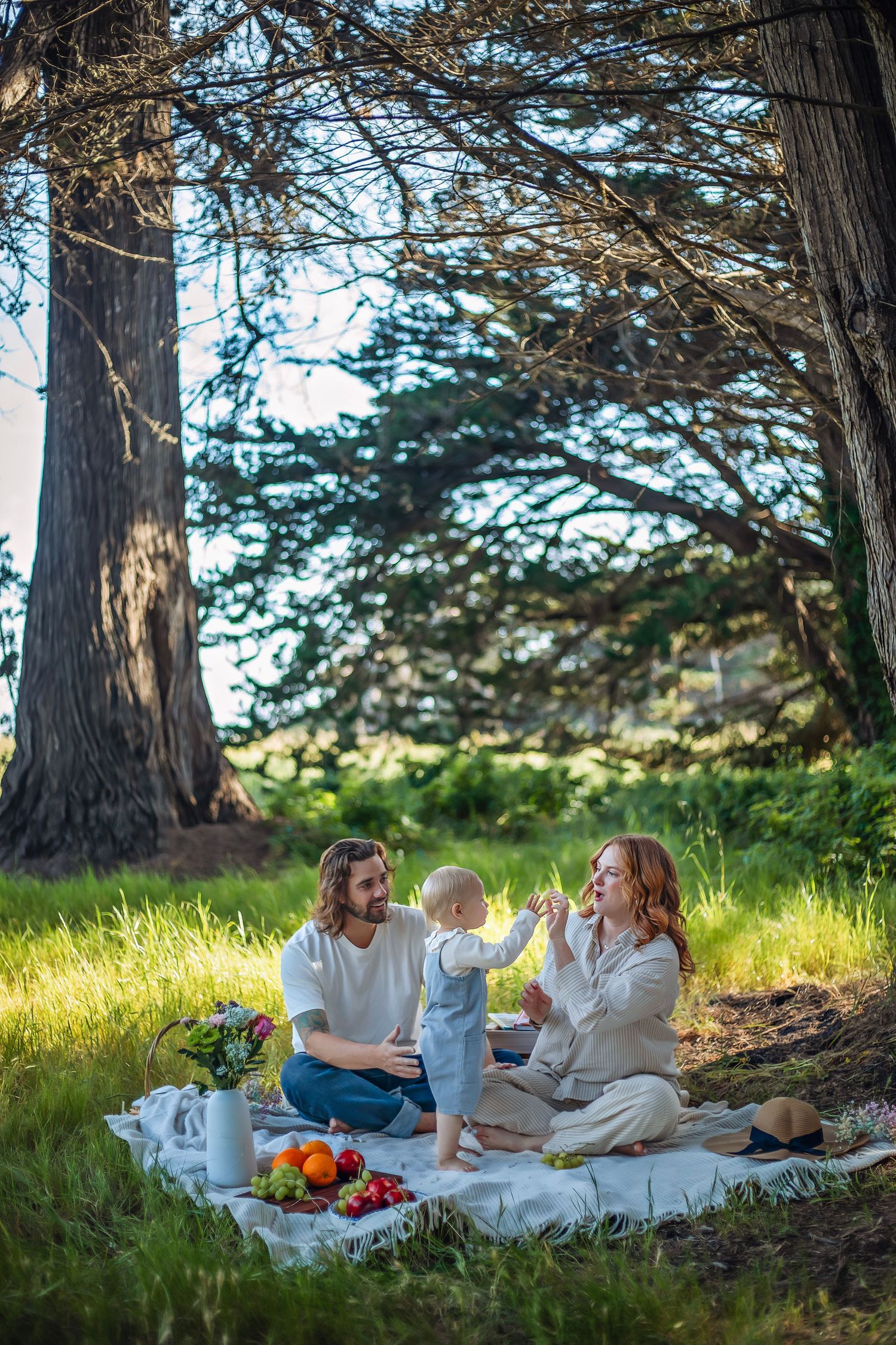 Family enjoying a picnic during a Santa Cruz photography session