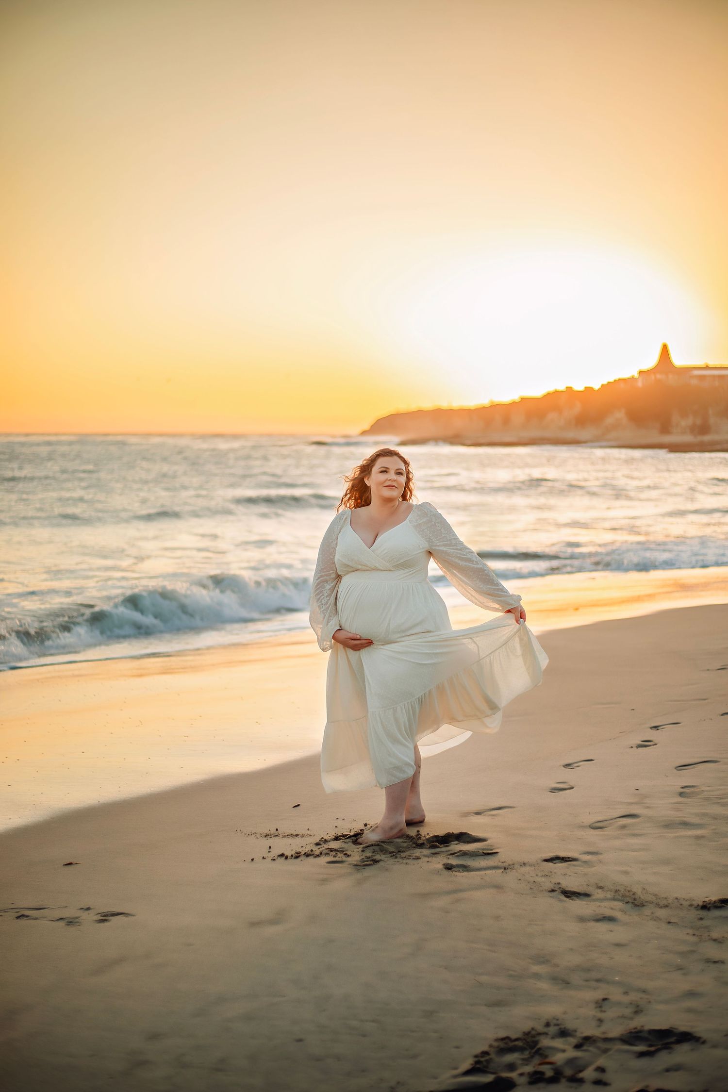 maternity photo session at a Santa Cruz beach, candid moments, ocean views, and a warm, relaxed coastal atmosphere.
