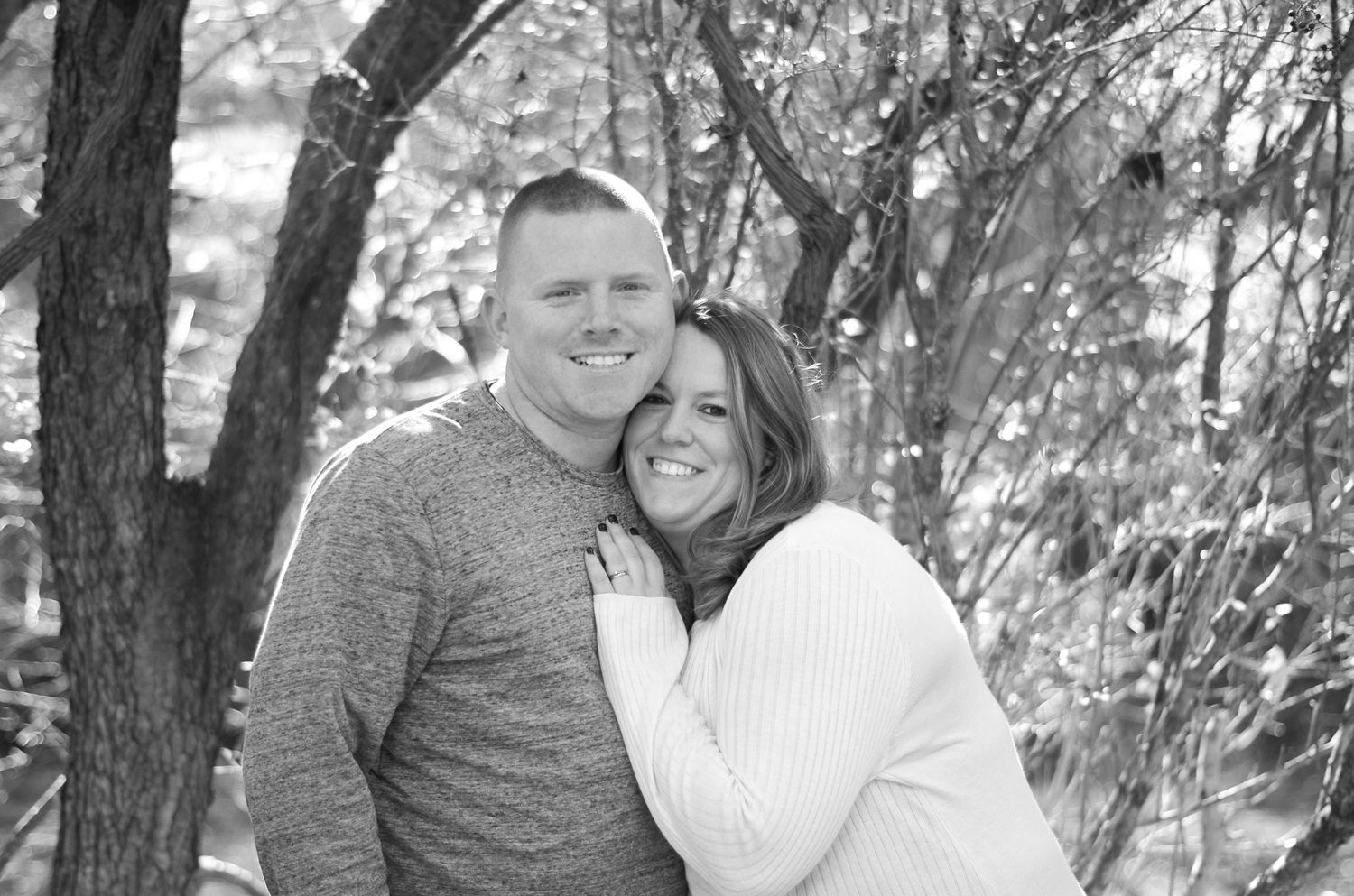 Black and white photo of husband and wife during family photo session in Harford County, MD