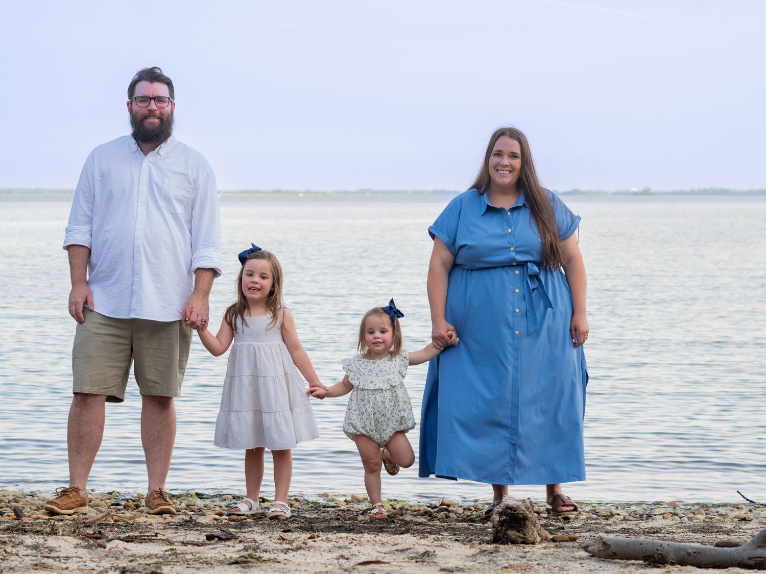 Family photo by the water in Havre de Grace, MD