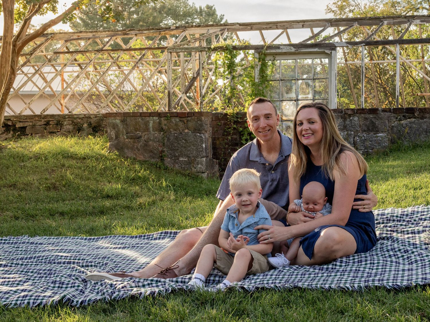Mom and dad with two sons during a Baltimore County, MD photo session.