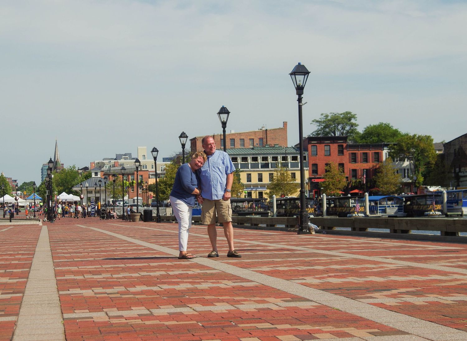Husband and wife in Fells Point, MD during anniversary photo session