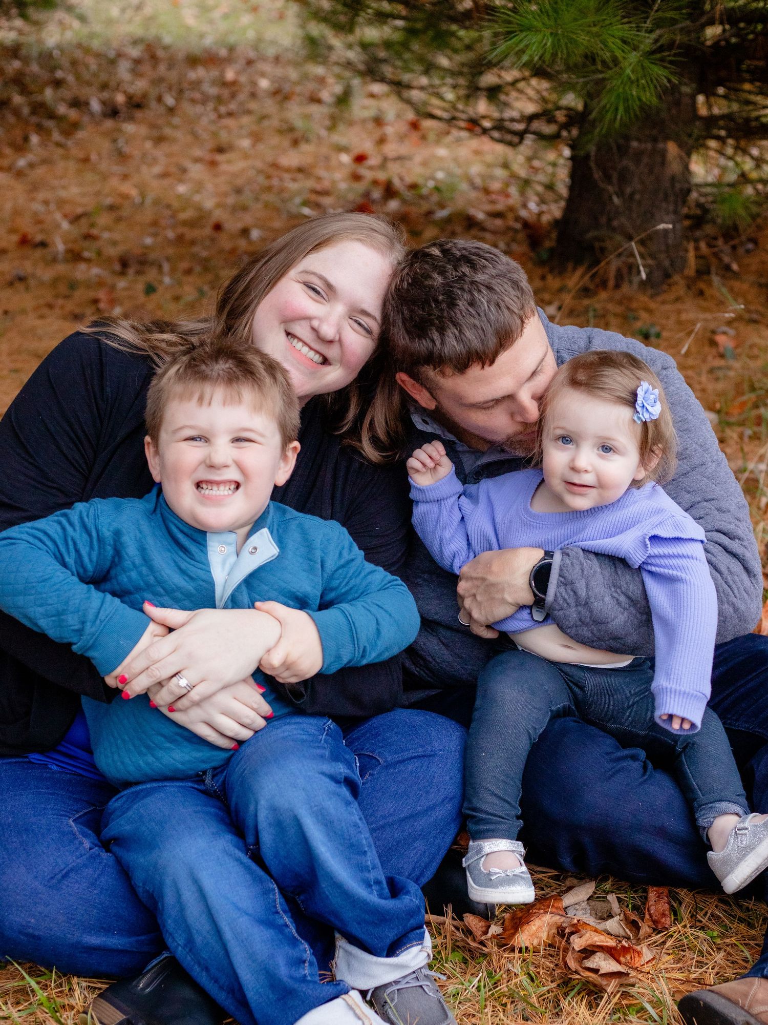 Family of four during a family photo session in Towson, MD