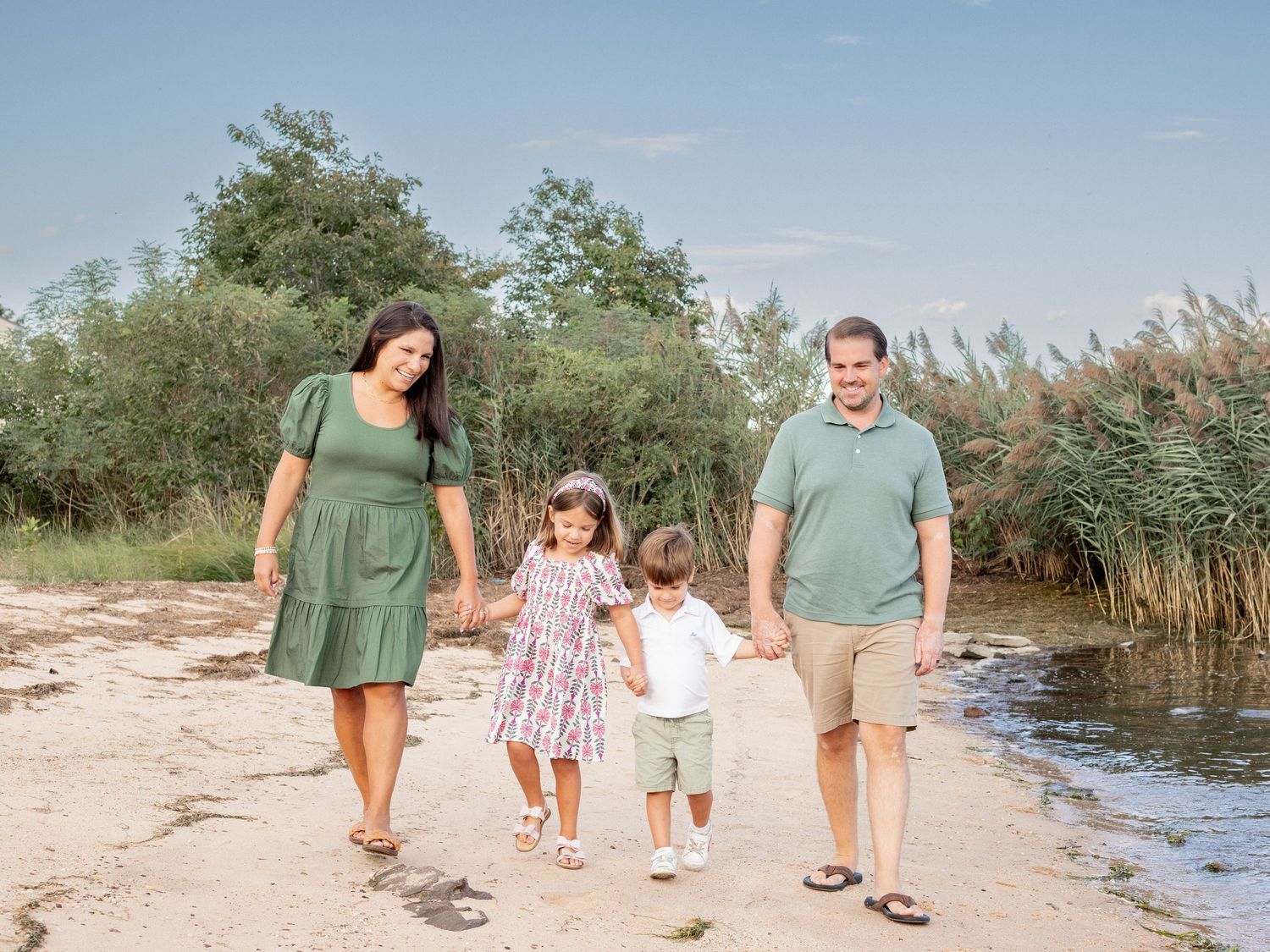 Family photo by the water in Middle River, MD