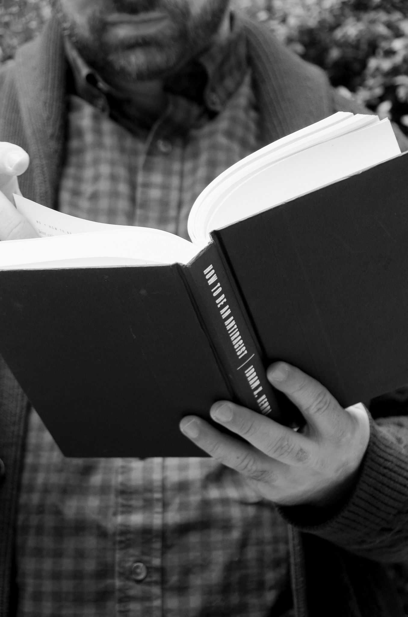 Branding business photo of man reading in Fells Point, MD
