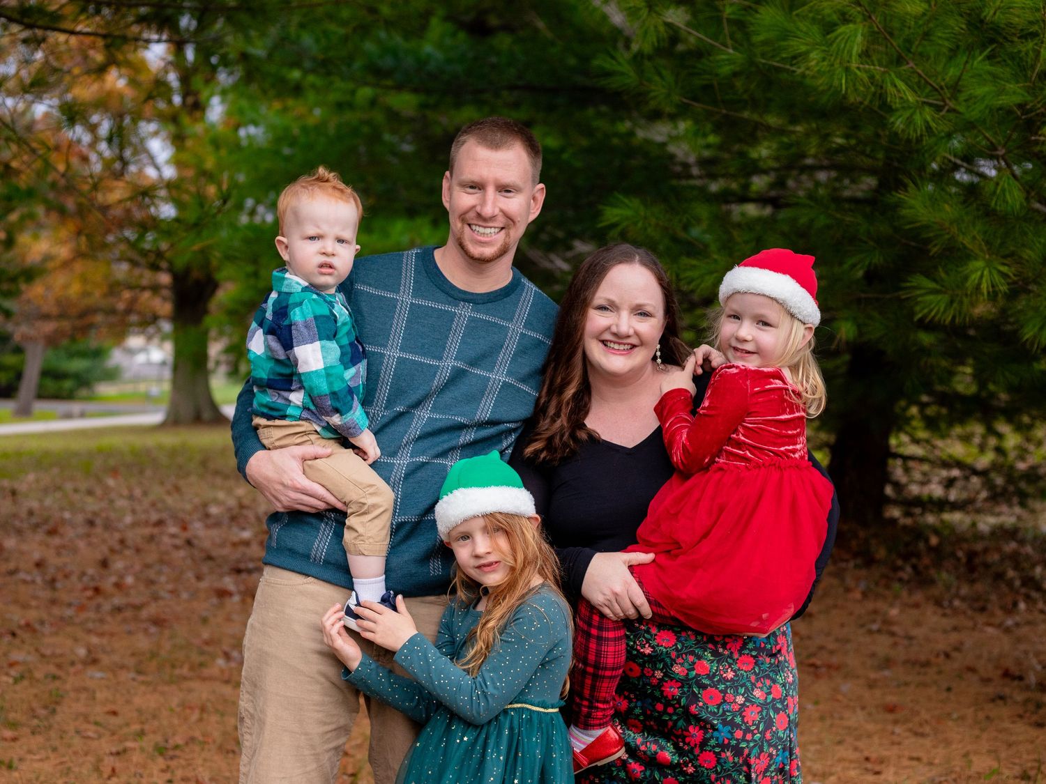 Family of five during Christmas photos in Towson, MD