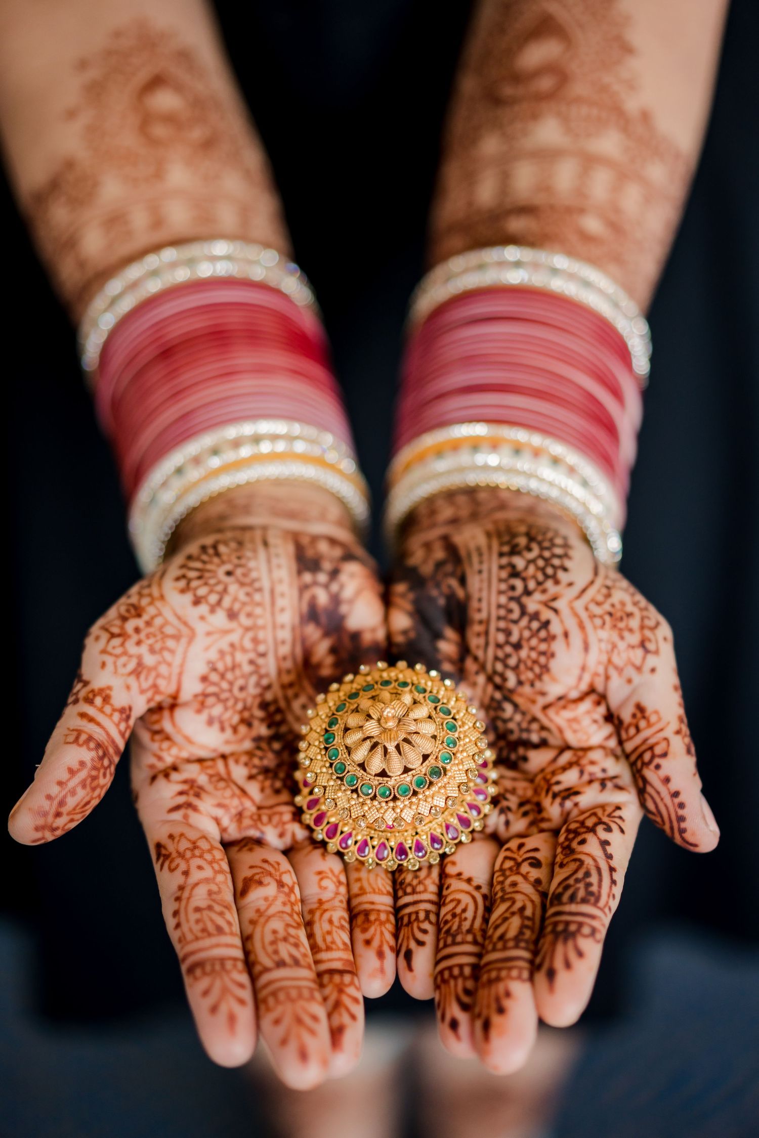 South Asian bridal jewelry and mehndi details captured during a luxury Indian destination wedding in Costa Rica.