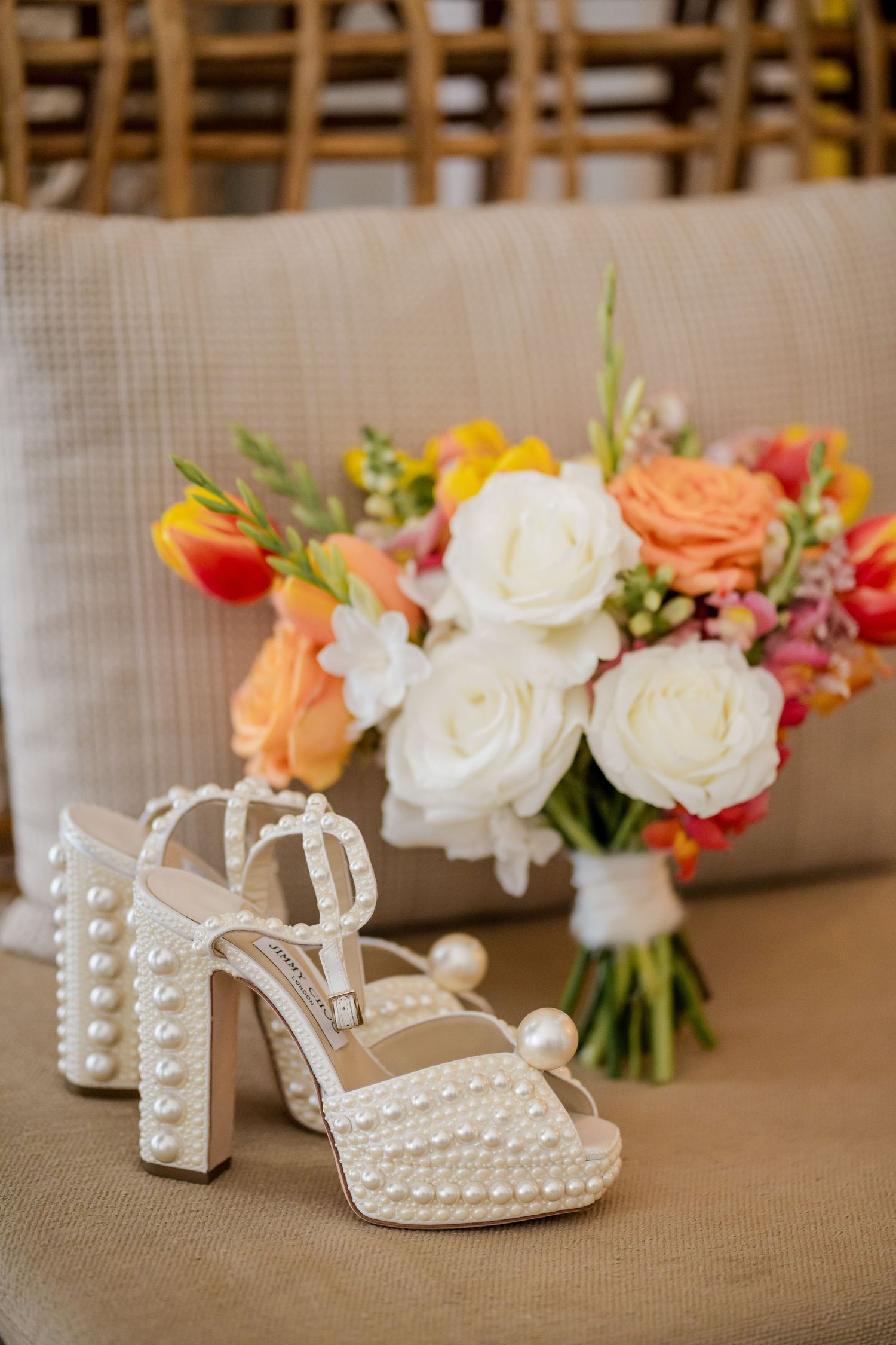 Designer bridal shoes styled with a tropical bouquet for a luxury destination wedding in Mangroove Hotel, Playa Panama, Costa Rica.