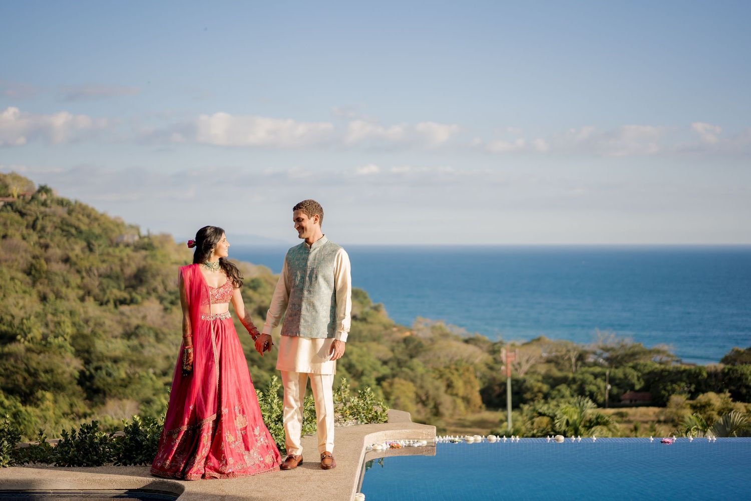 Couple portrait overlooking Punta Islita Beach, Costa Rica, celebrating the beauty of a luxury destination wedding.