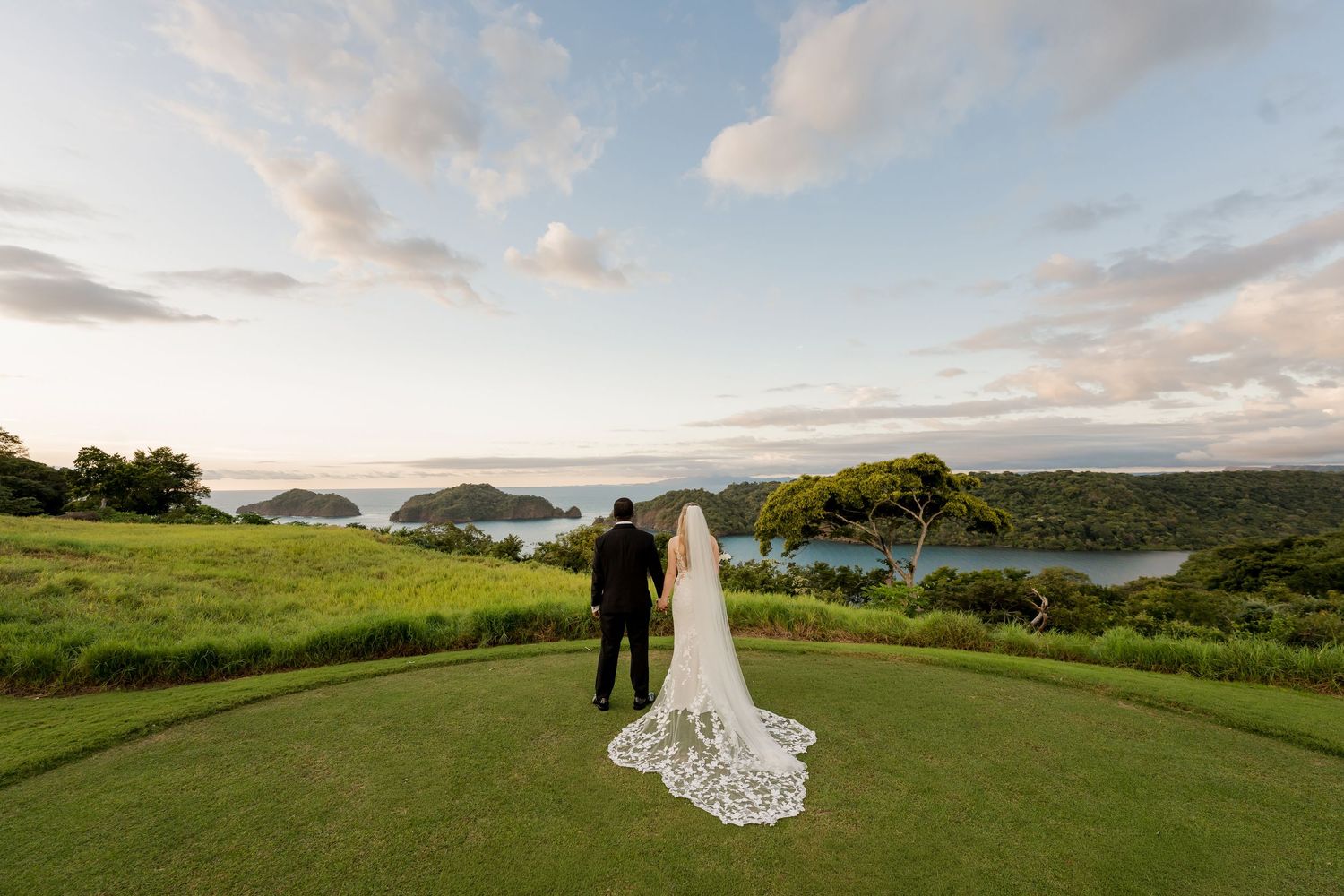 Luxury destination wedding overlooking Culebra Bay, Peninsula Papagayo, Guanacaste, Costa Rica with panoramic ocean views.
