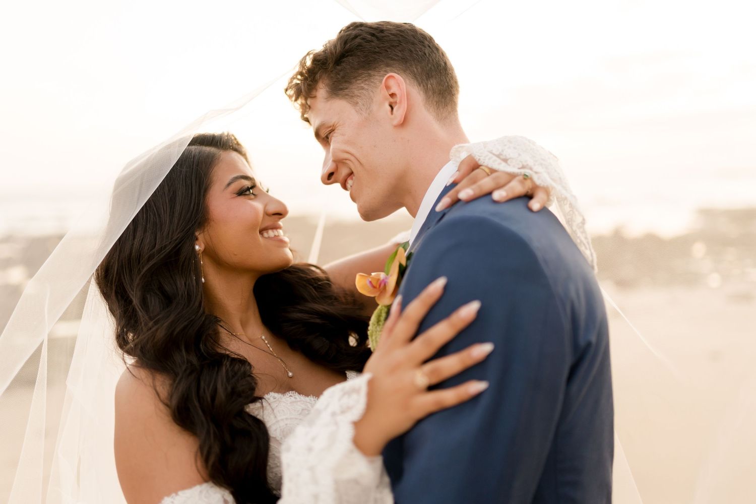 Editorial-style wedding portrait capturing genuine connection between newlyweds in soft natural light in Pinilla, Guanacaste.