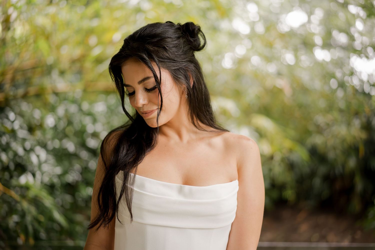 Soft bridal portrait highlighting natural wedding hair, effortless beauty, and contemporary bridal styling.