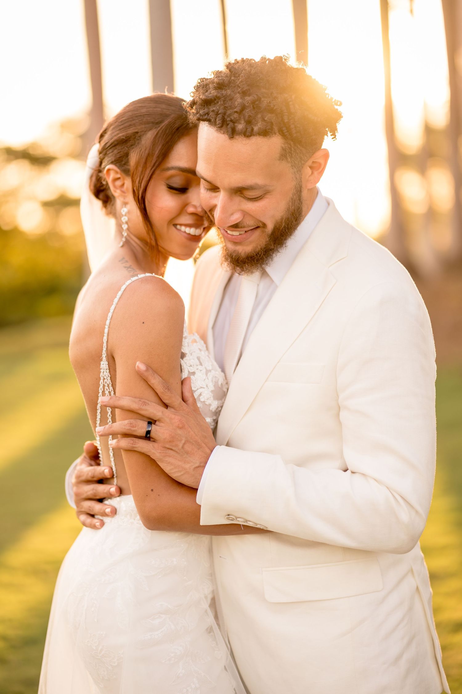 Natural golden light illuminating an intimate wedding portrait during a luxury destination celebration.