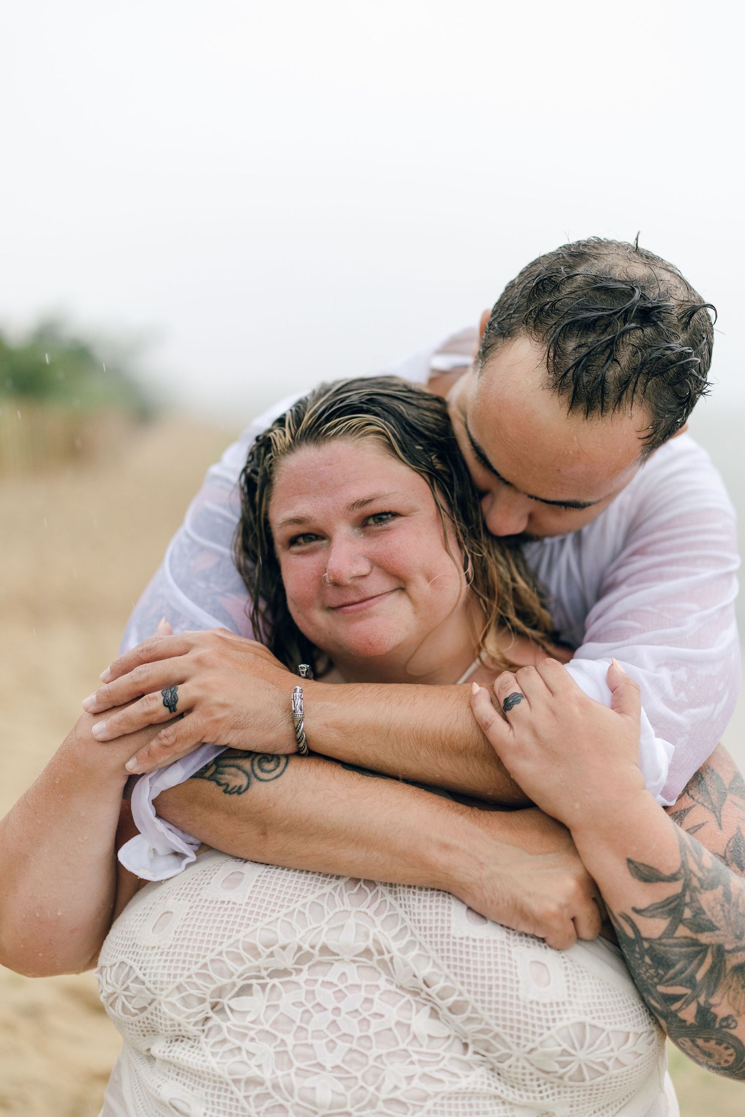 A romantic rainy engagement session at Terrapin Nature Park in Maryland.