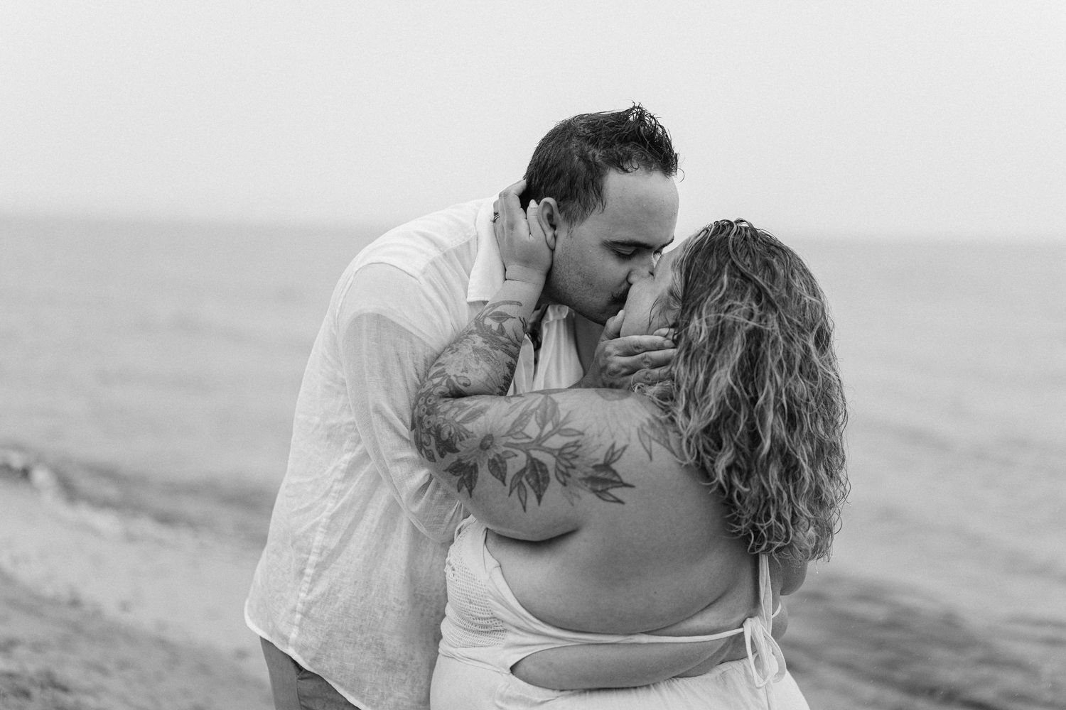 A romantic rainy engagement session at Terrapin Nature Park in Maryland.