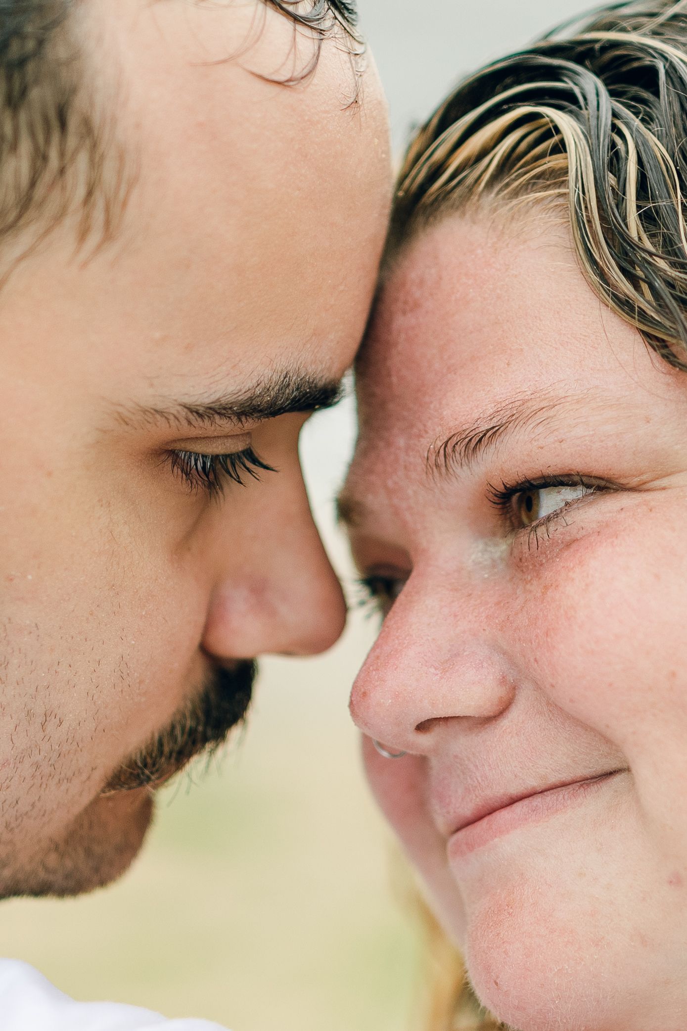 A romantic rainy engagement session at Terrapin Nature Park in Maryland.