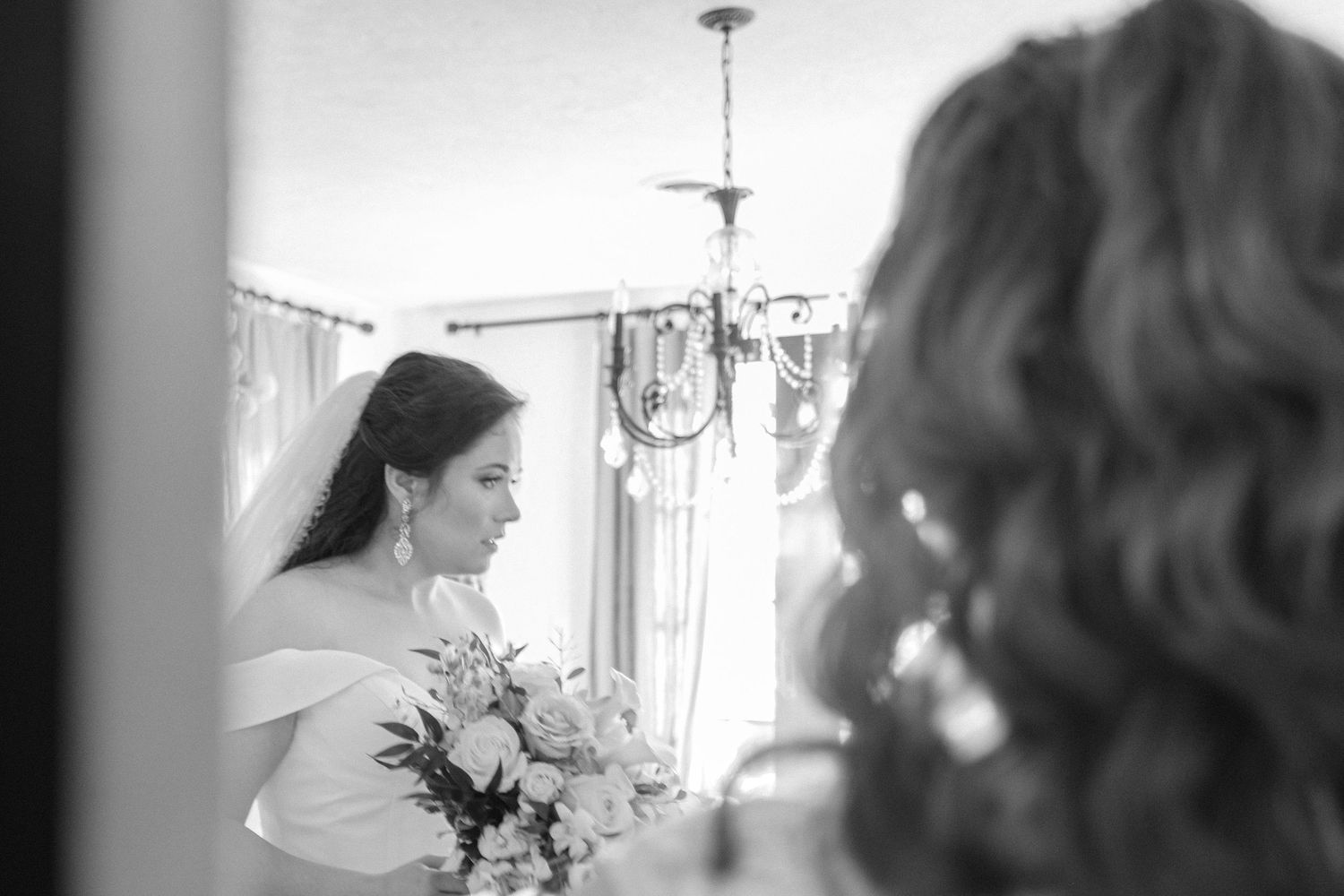 Black and white photo of bride getting ready for ceremony at Chateau Selah wedding in Tennessee.