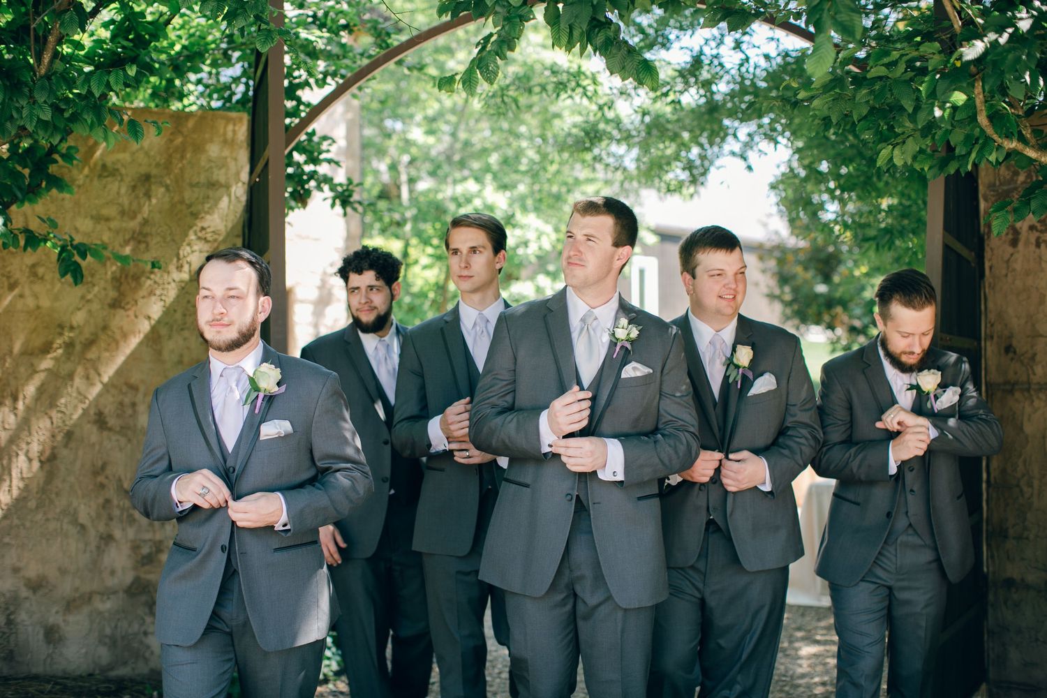 Groomsmen and groom posing for a portrait at Chateau Selah wedding in Tennessee.