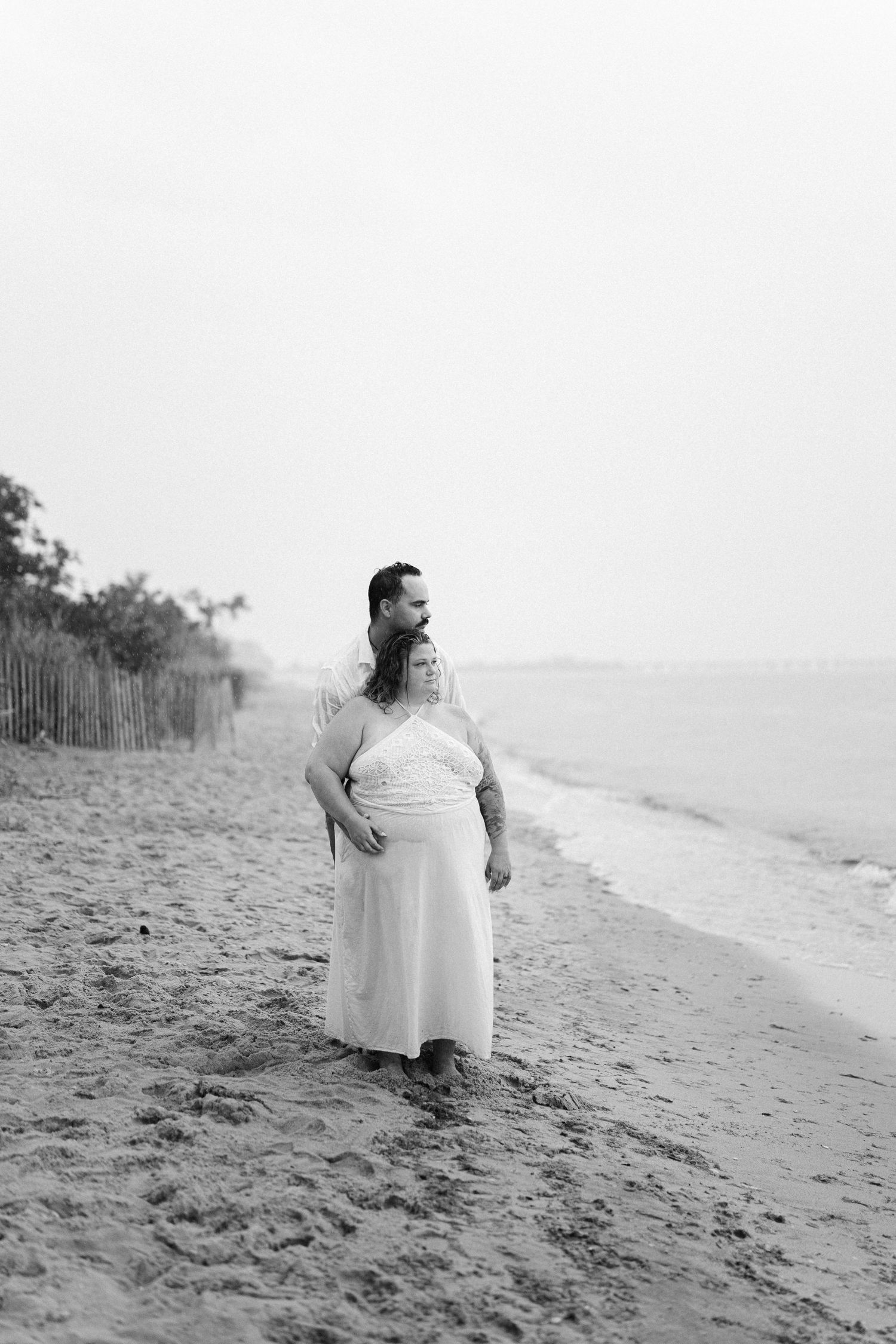 A romantic rainy engagement session at Terrapin Nature Park in Maryland.