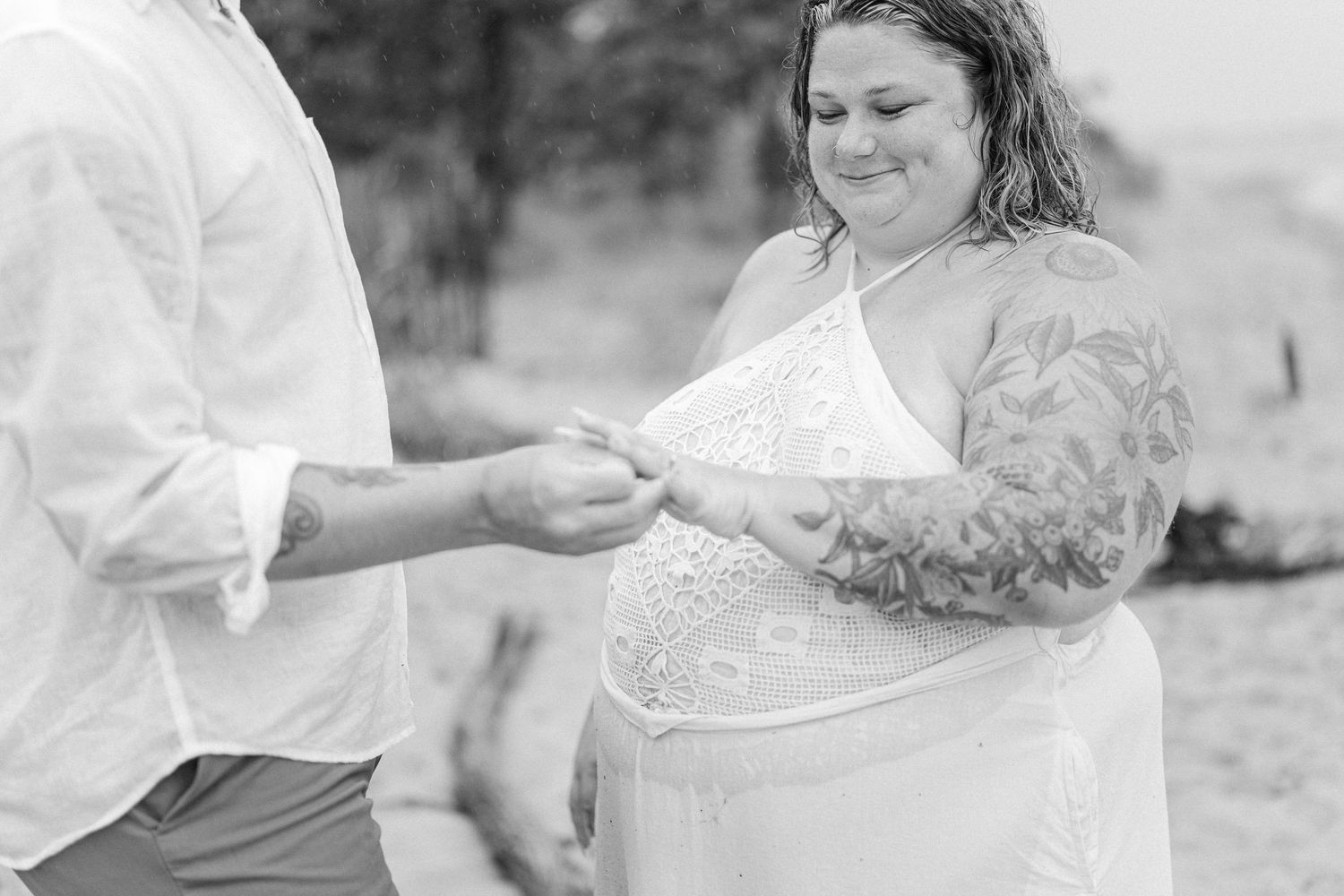 A romantic rainy engagement session at Terrapin Nature Park in Maryland.
