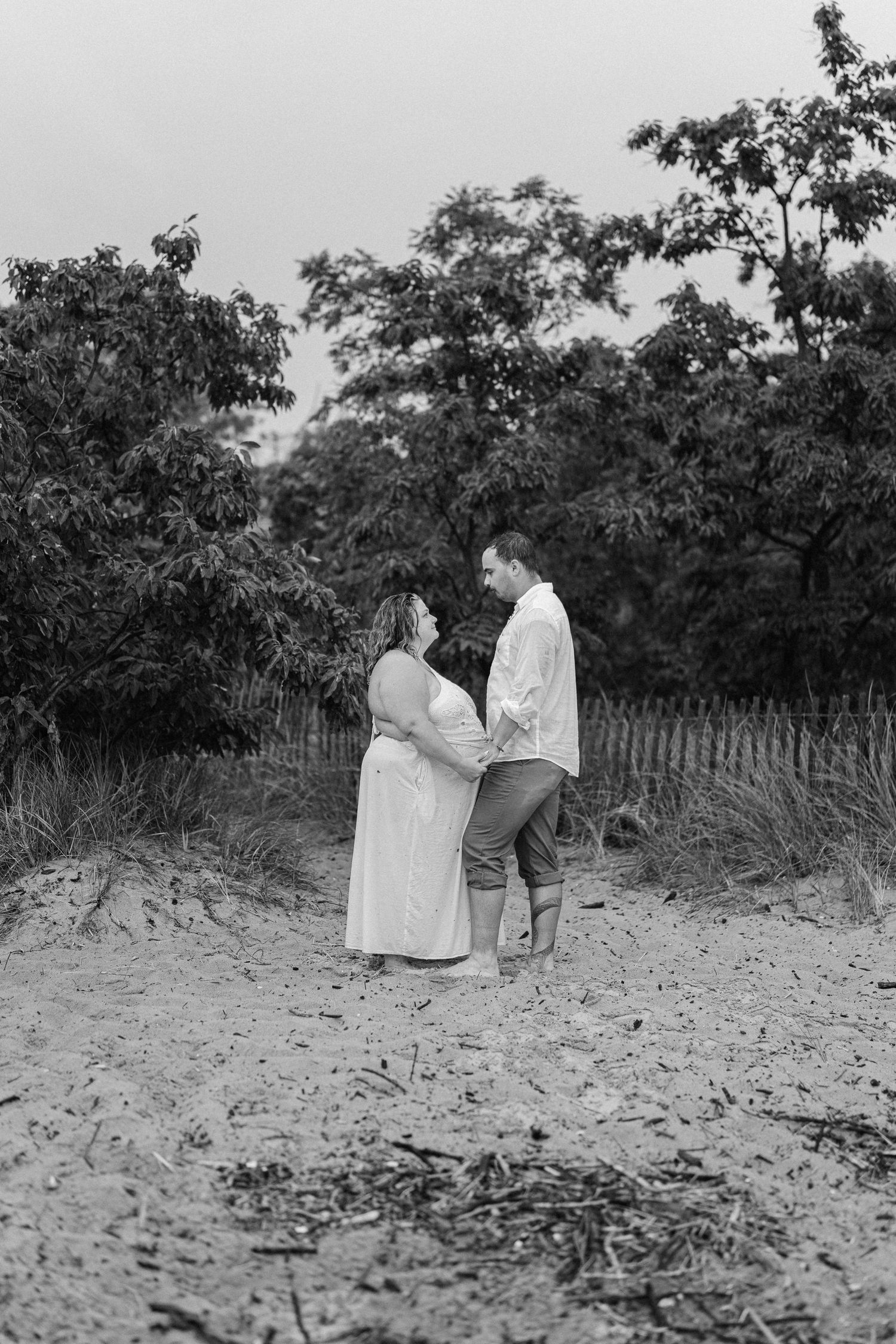 A romantic rainy engagement session at Terrapin Nature Park in Maryland.