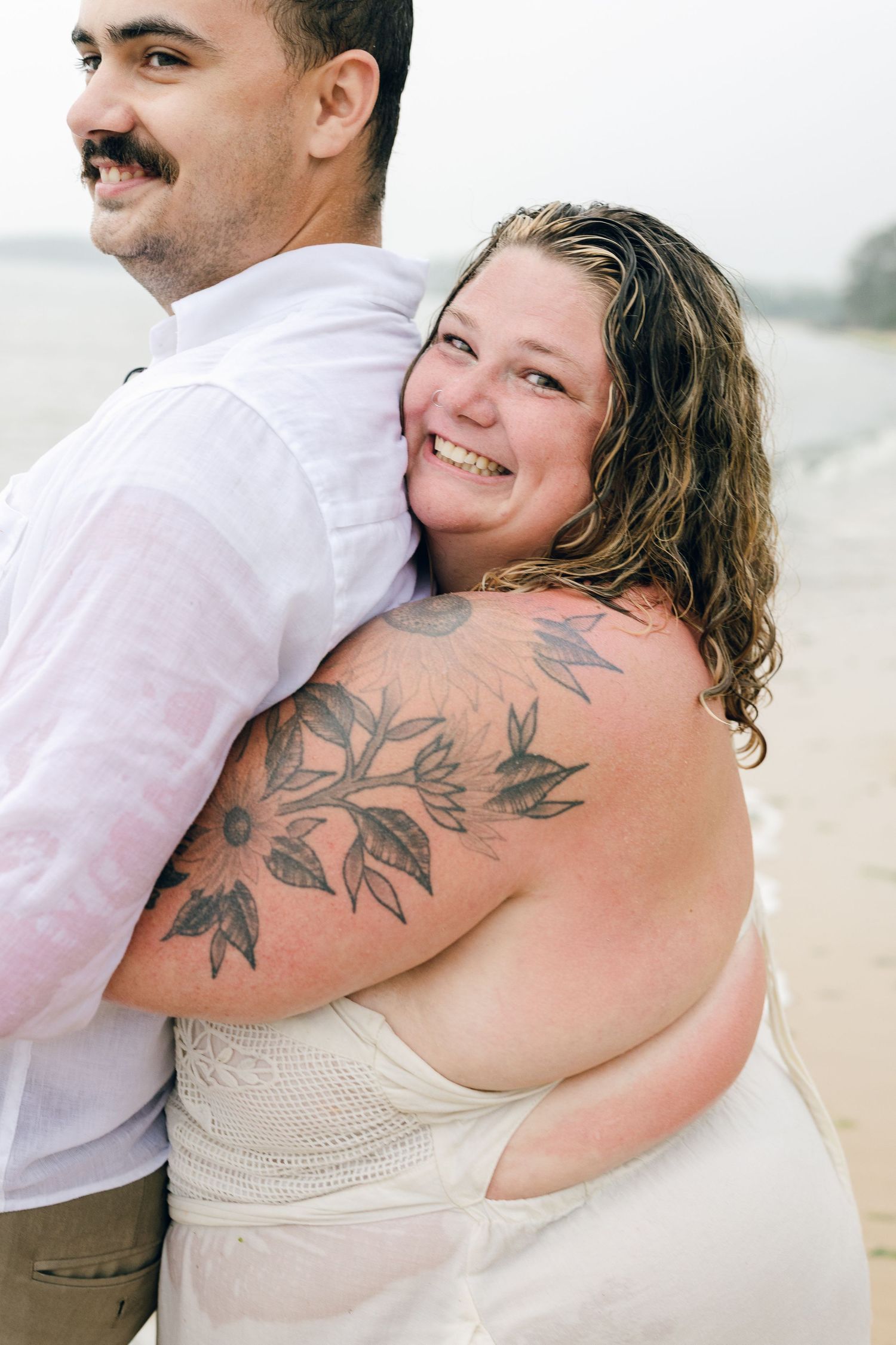 A romantic rainy engagement session at Terrapin Nature Park in Maryland.