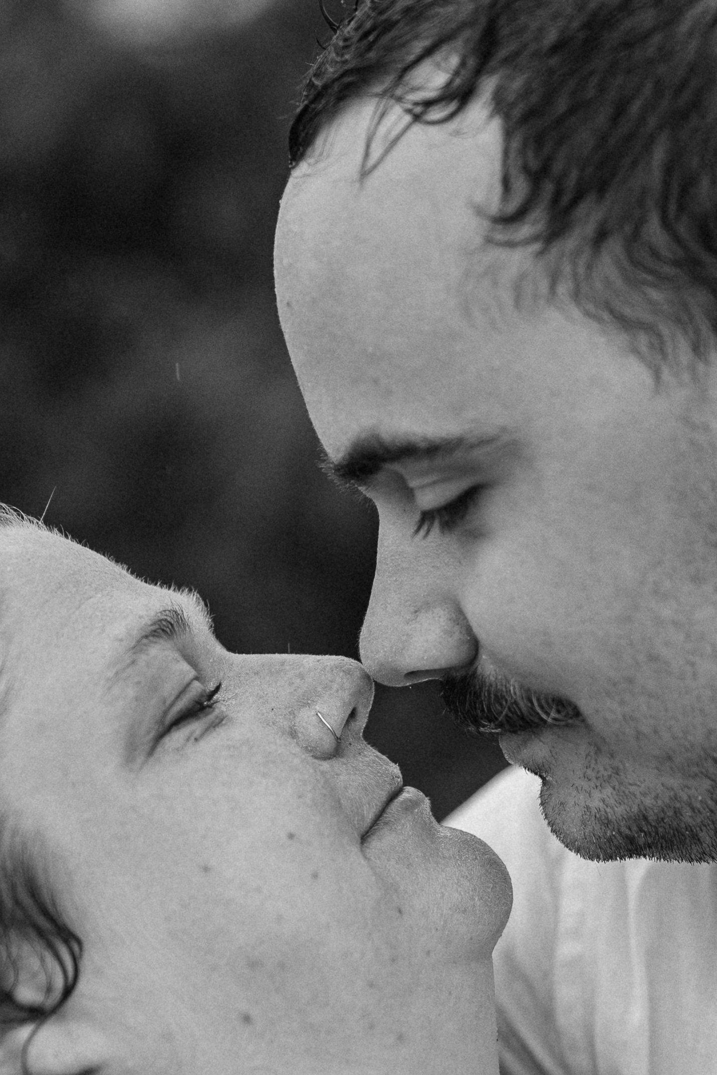 A romantic rainy engagement session at Terrapin Nature Park in Maryland.