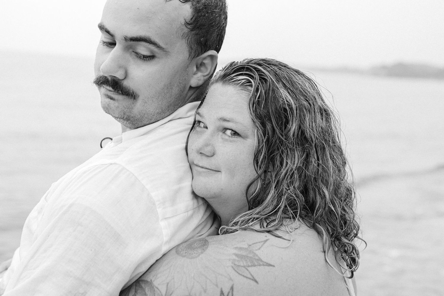 A romantic rainy engagement session at Terrapin Nature Park in Maryland.