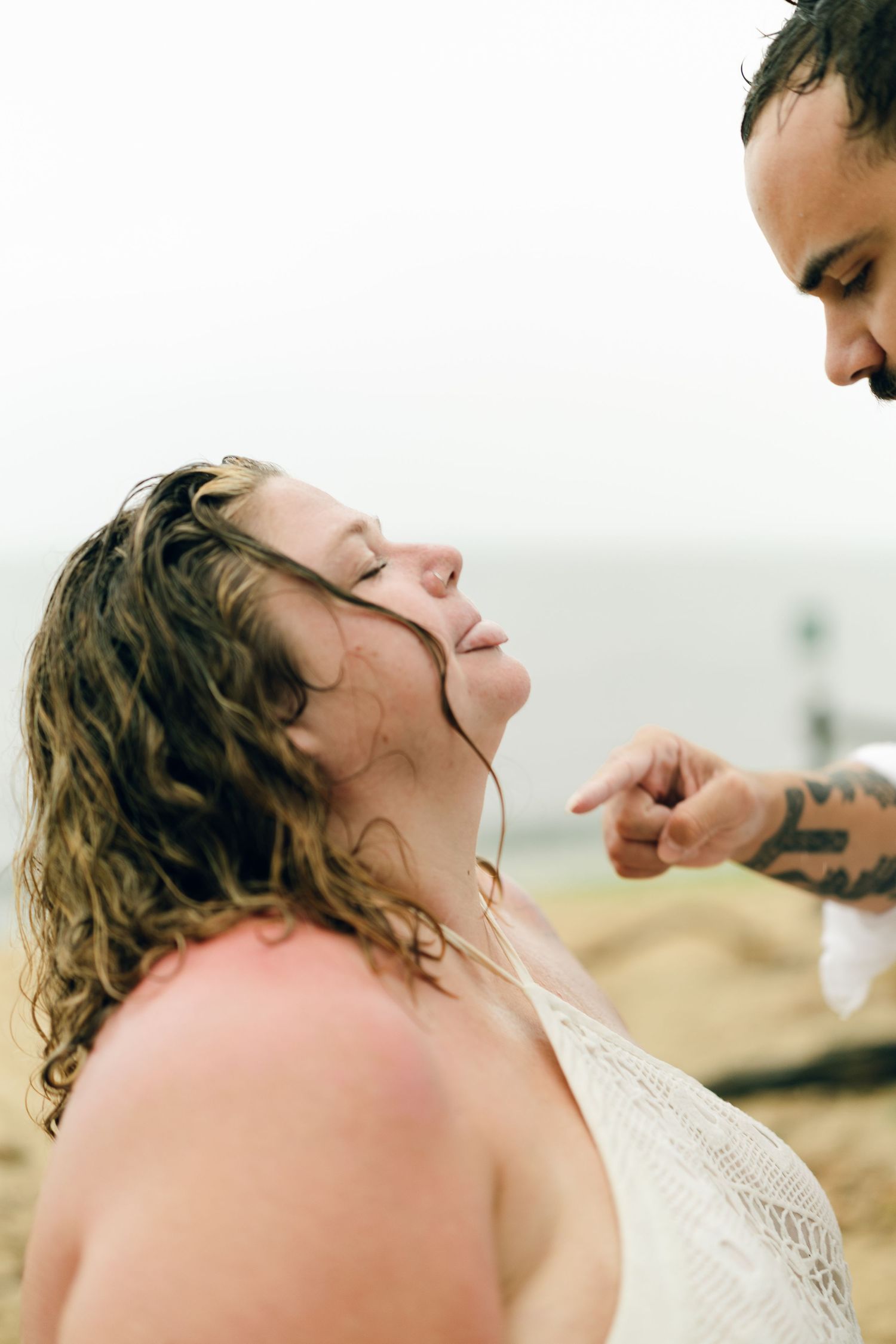 A romantic rainy engagement session at Terrapin Nature Park in Maryland.