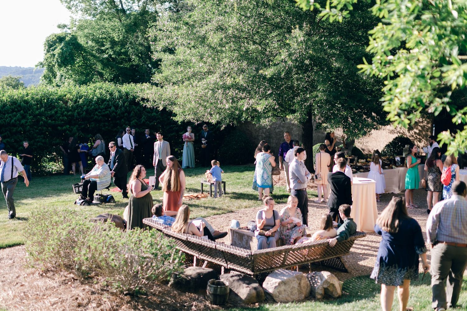 Guests mingle during cocktail hour at Chateau Selah wedding in Tennessee.