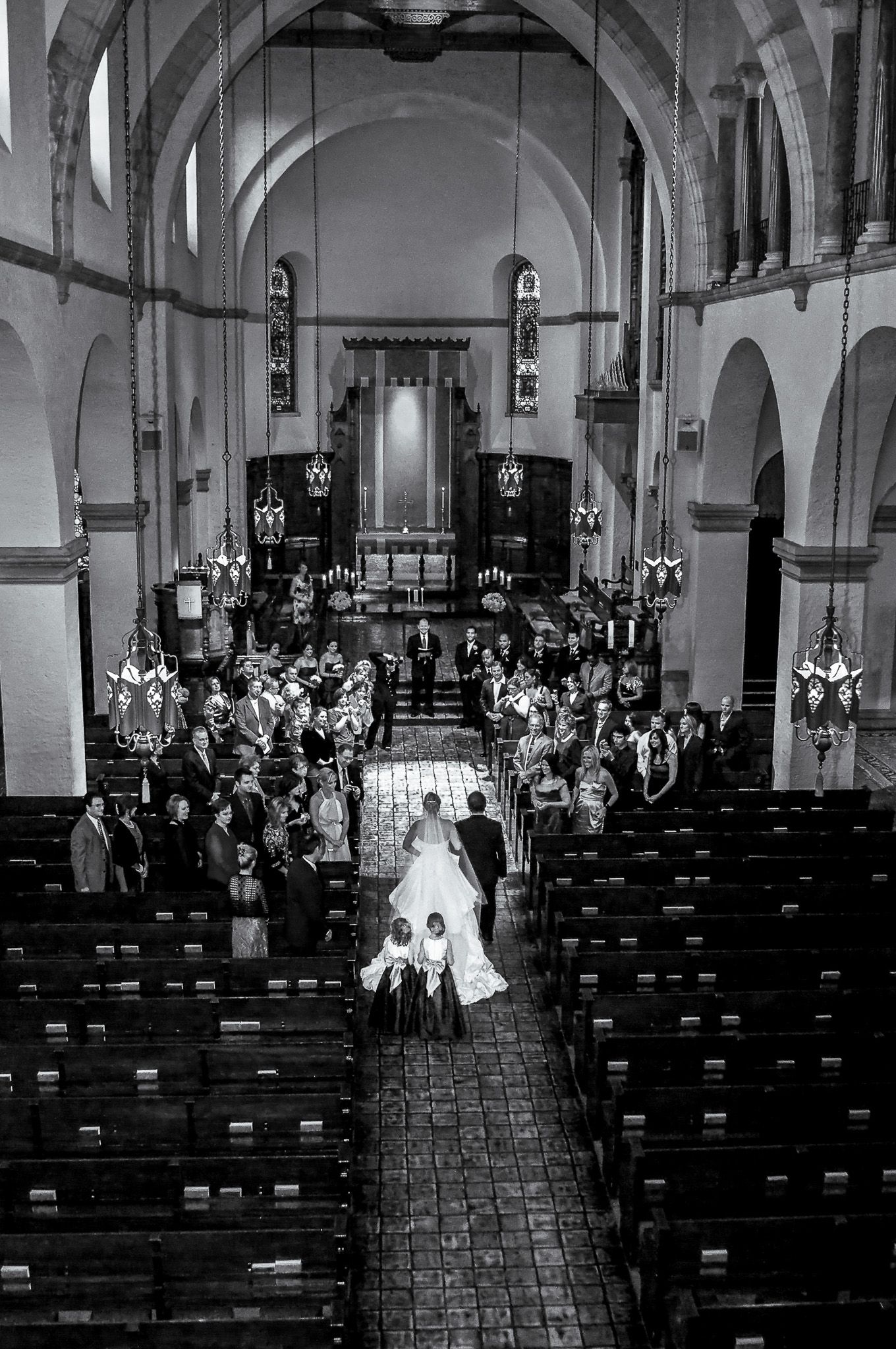Aerial view of church wedding ceremony from back of sanctuary.